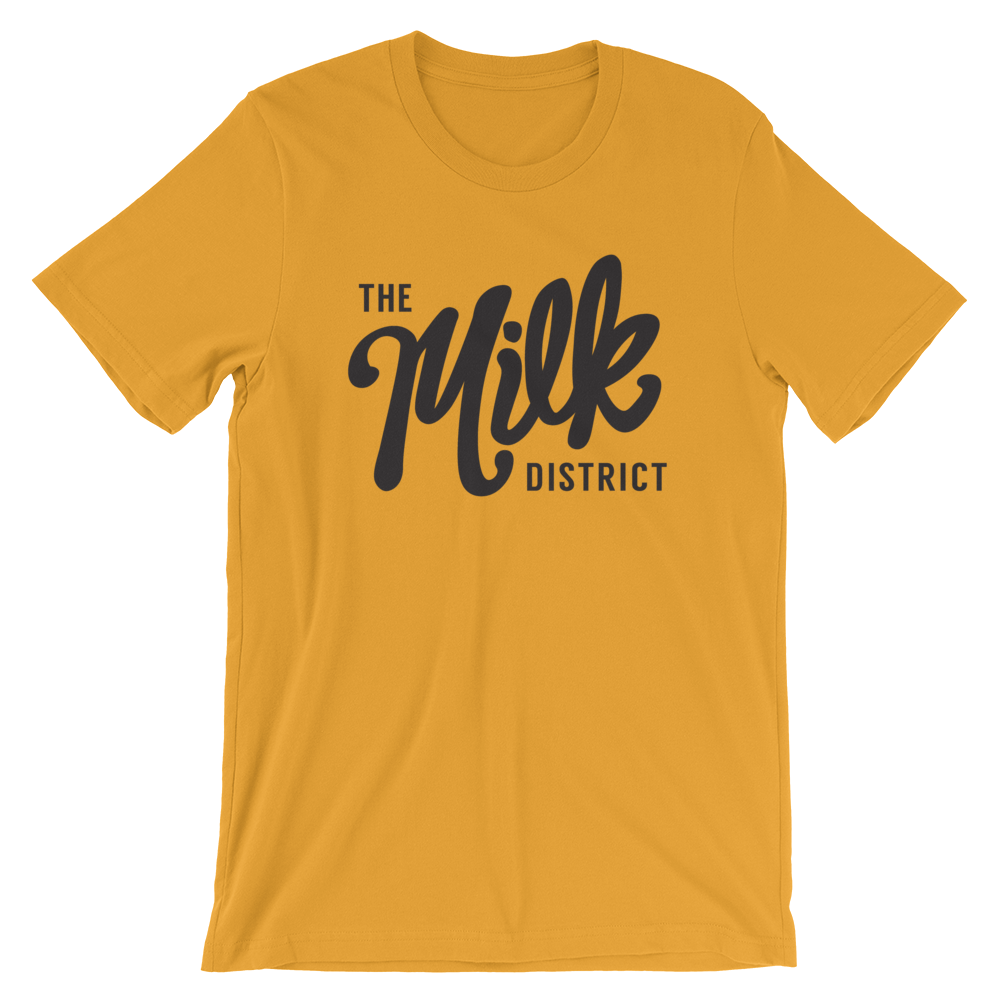 MilkDistrict_logo_Blk_1up_mockup_Front_Wrinkled_Mustard.png