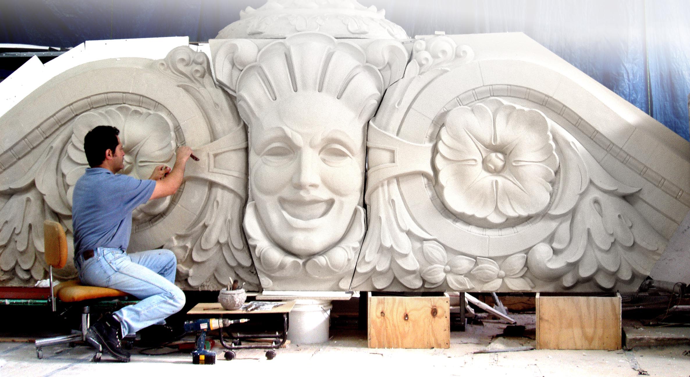  A sculptor working on a plaster sculptural element for Sheas Theatre in Buffalo NY 