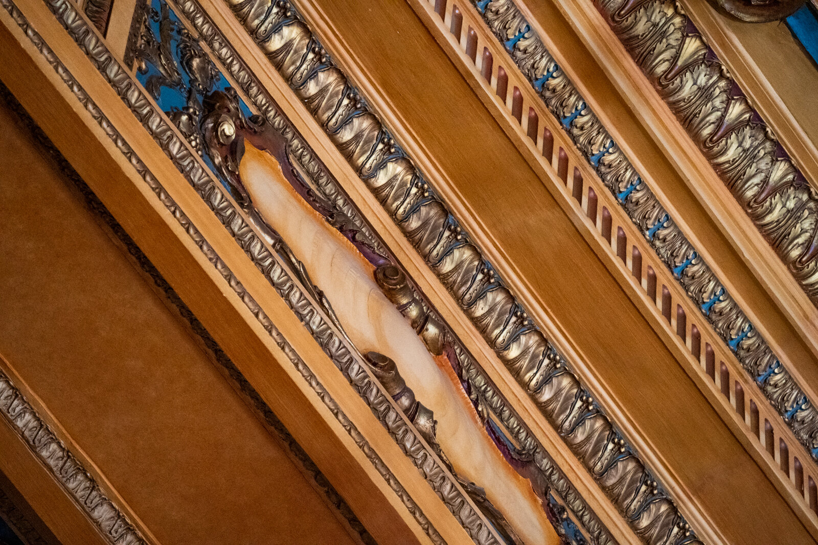  Cast plaster ceiling cornice in sheas theatre, buffalo New York. painted gold with blue and silver accents. 