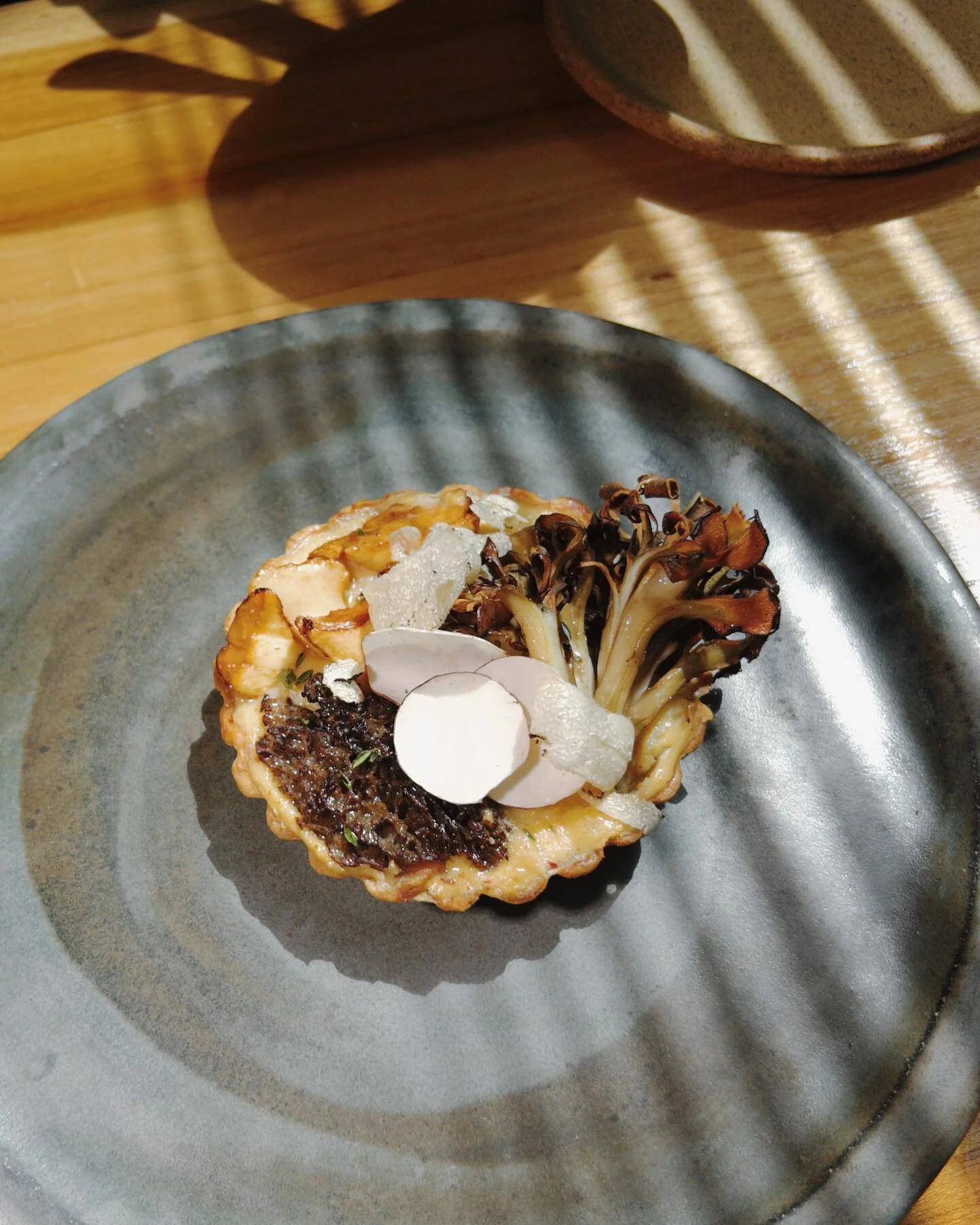 mushroom tart, scallop mousse, wild mushrooms.