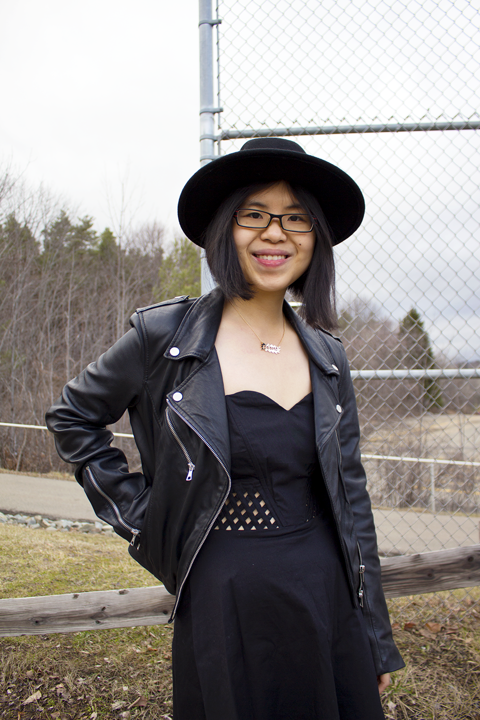 Classic and edgy all black outfit with black lattice dress, ZARA leather jacket, hat, and Opening Ceremony leather boots.