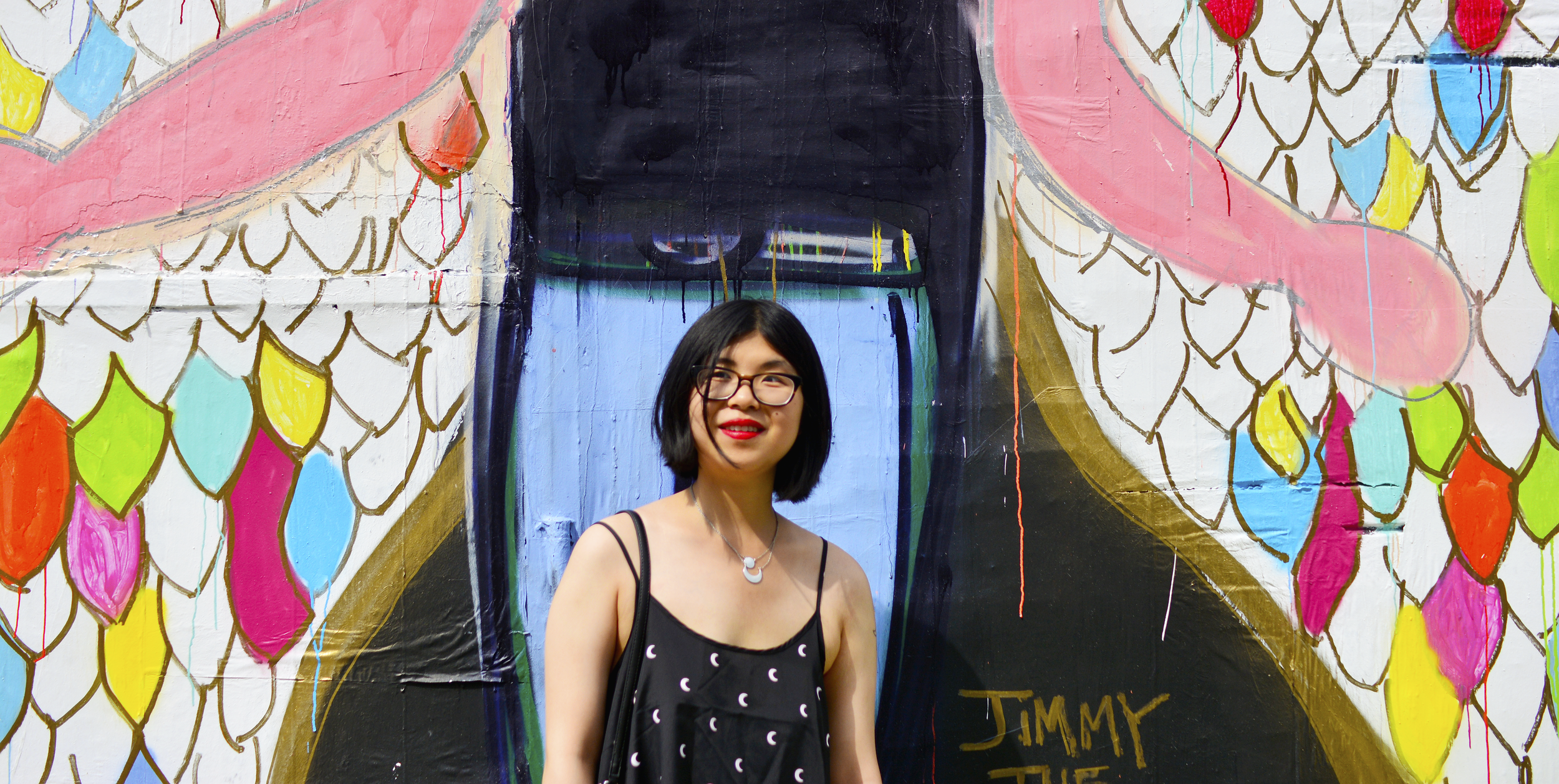 Exploring the Welling Court Mural Project 2016 in Queens, NYC. Discovering beautiful and powerful graffiti art in moon print dress.
