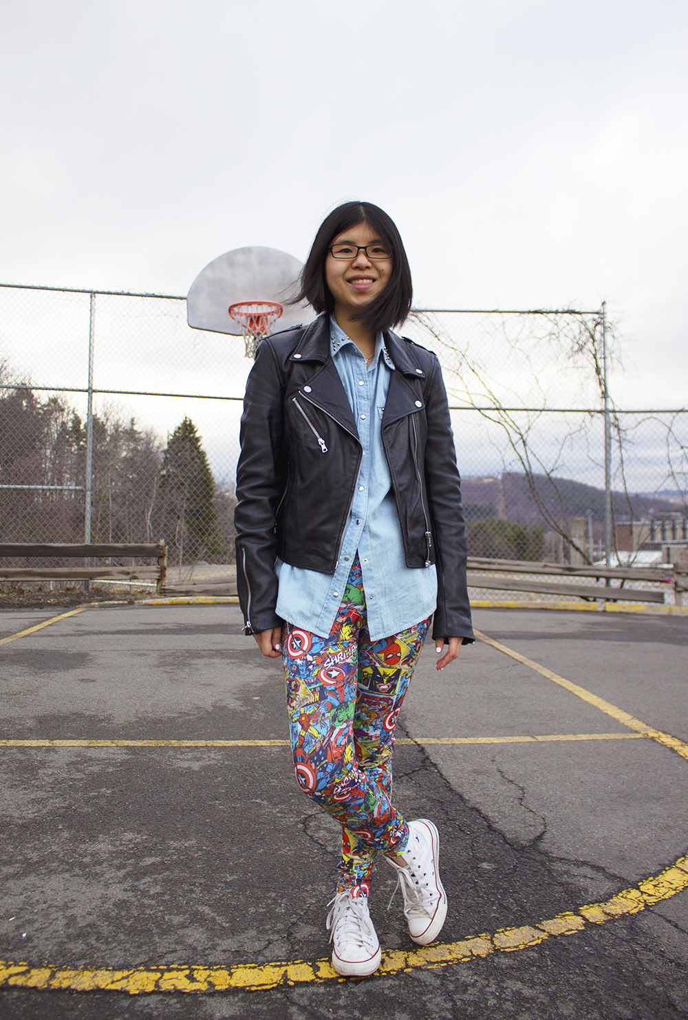 Keeping it casual with a MARVEL's superheroes leggings, chambray shirt, leather jacket and classic Chuck Taylors
