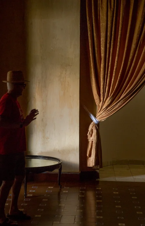 Hotel Ballroom with Man in Shadow