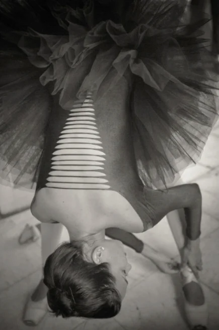 Dancer Tying Ballet Shoes