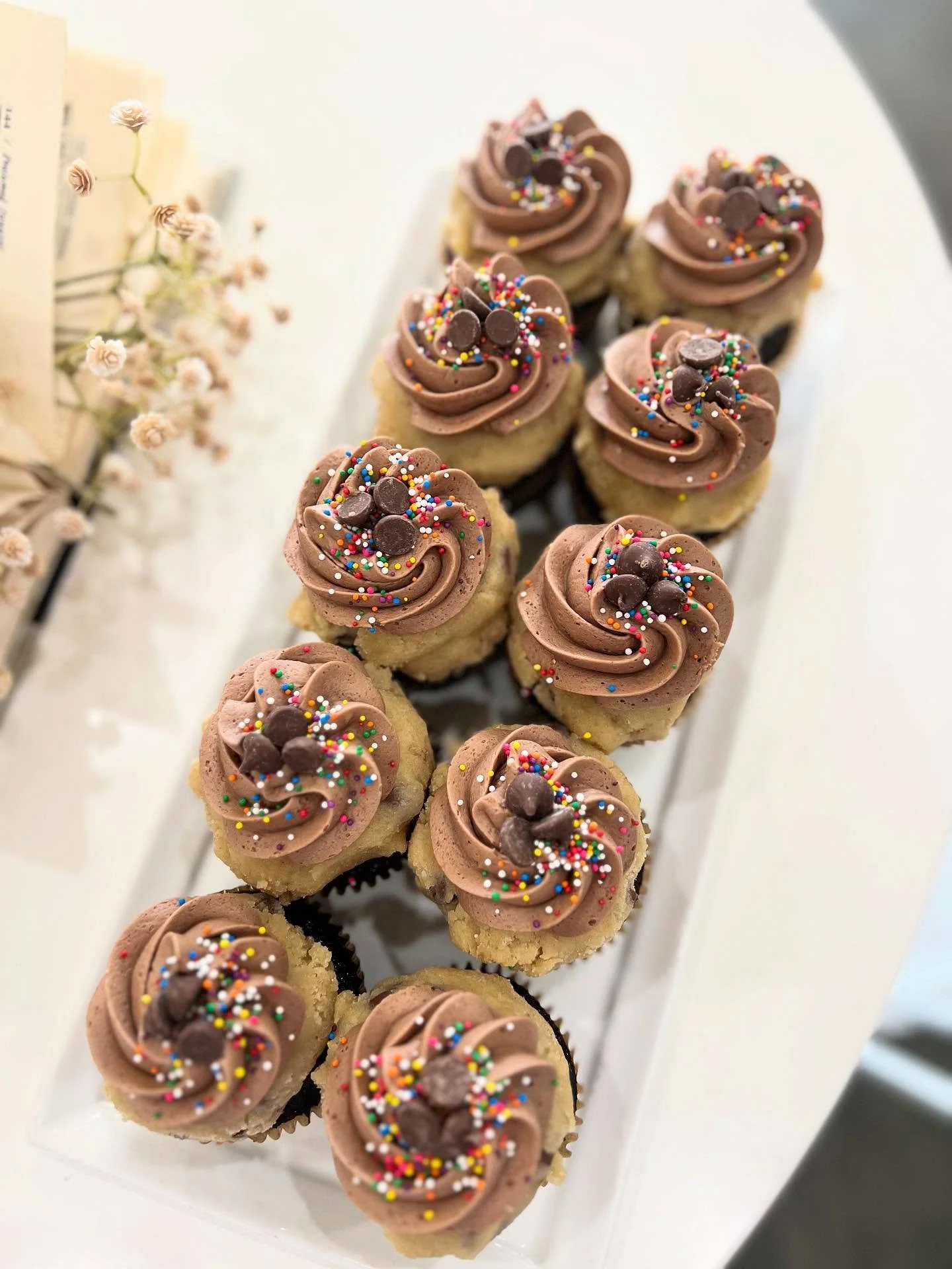 The classic that never goes out of style 🍪✨
Chocolate cupcakes topped with edible cookie dough &mdash; soft, sweet, and topped with a swirl of chocolate buttercream. #JustDelicious #CupcakeLove #ClassicFavorites #BakedWithLove #sweettoothapproved