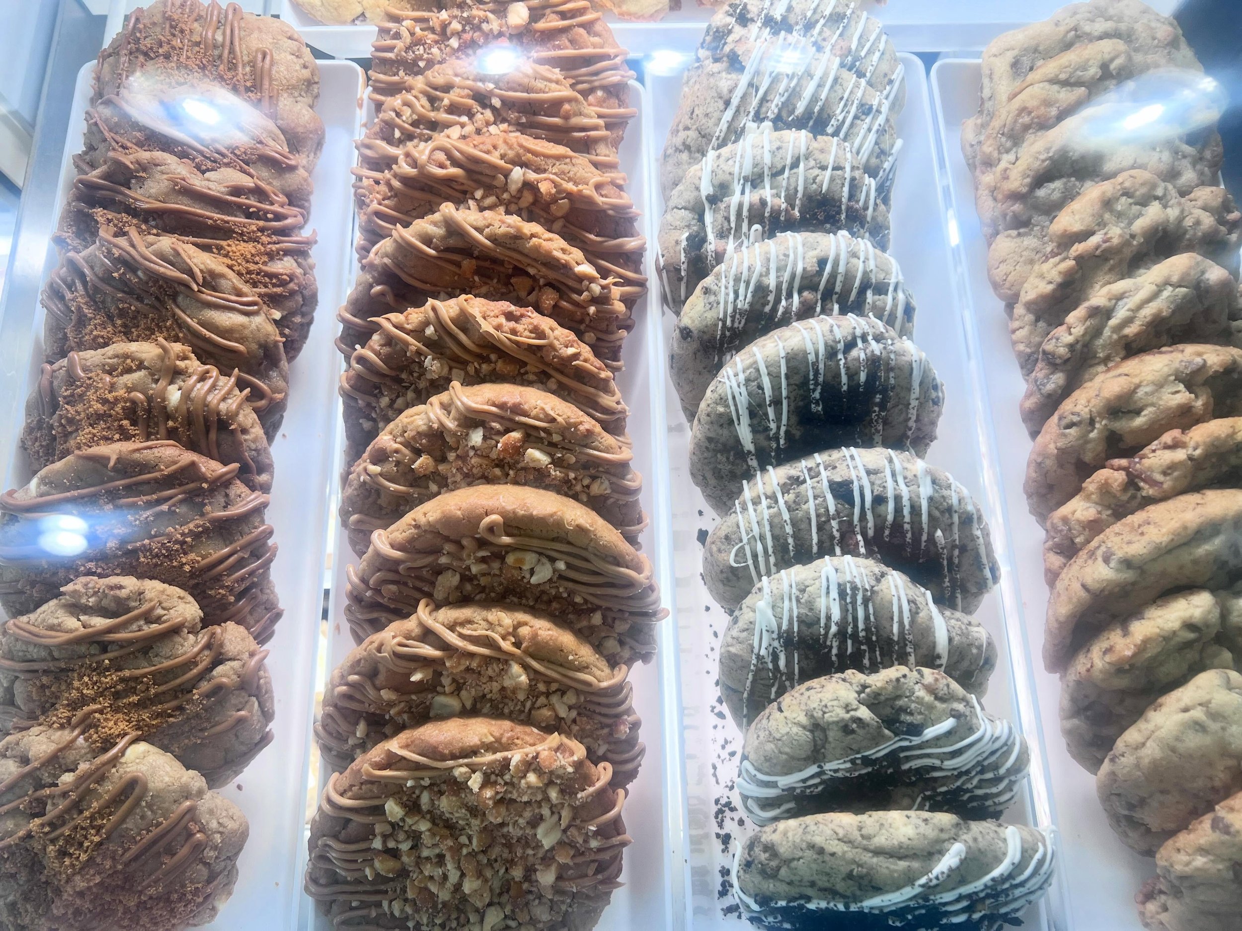 Loaded, stuffed, drizzled, and dangerously good. Which one are you grabbing first? 👀

#JustDelicious #CookieLovers #LoadedCookies #FreshBaked #CookieCase
