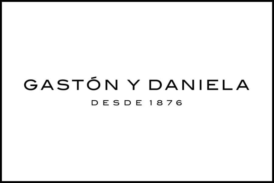 Black and white logo with text reading 'Gaston y Daniela desde 1876'