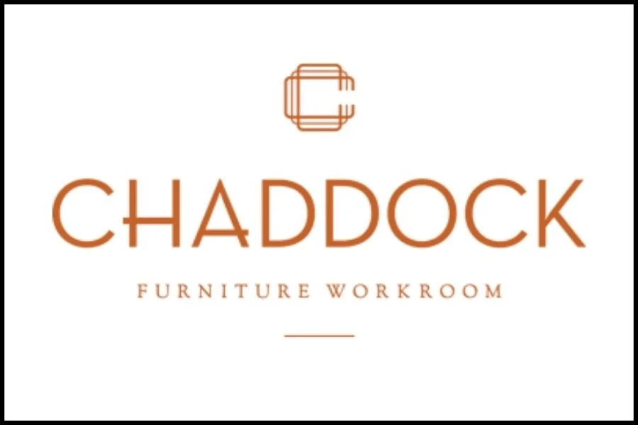 The logo for ChadDock Furniture Workroom, featuring a stylized geometric icon above the name.