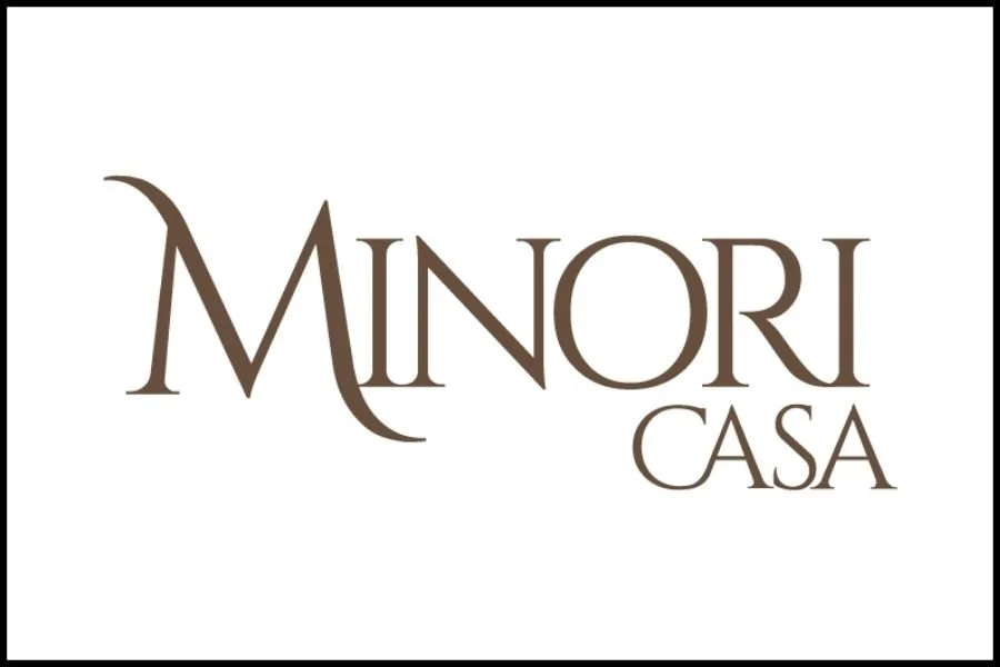 Logo with the text 'MINORI CASA' in brown letters on a white background.