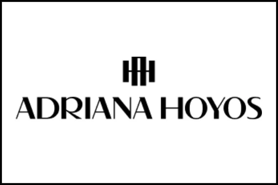 Logo with stylized black lettering and symbol reading "Adriana Hoyos" on a white background.