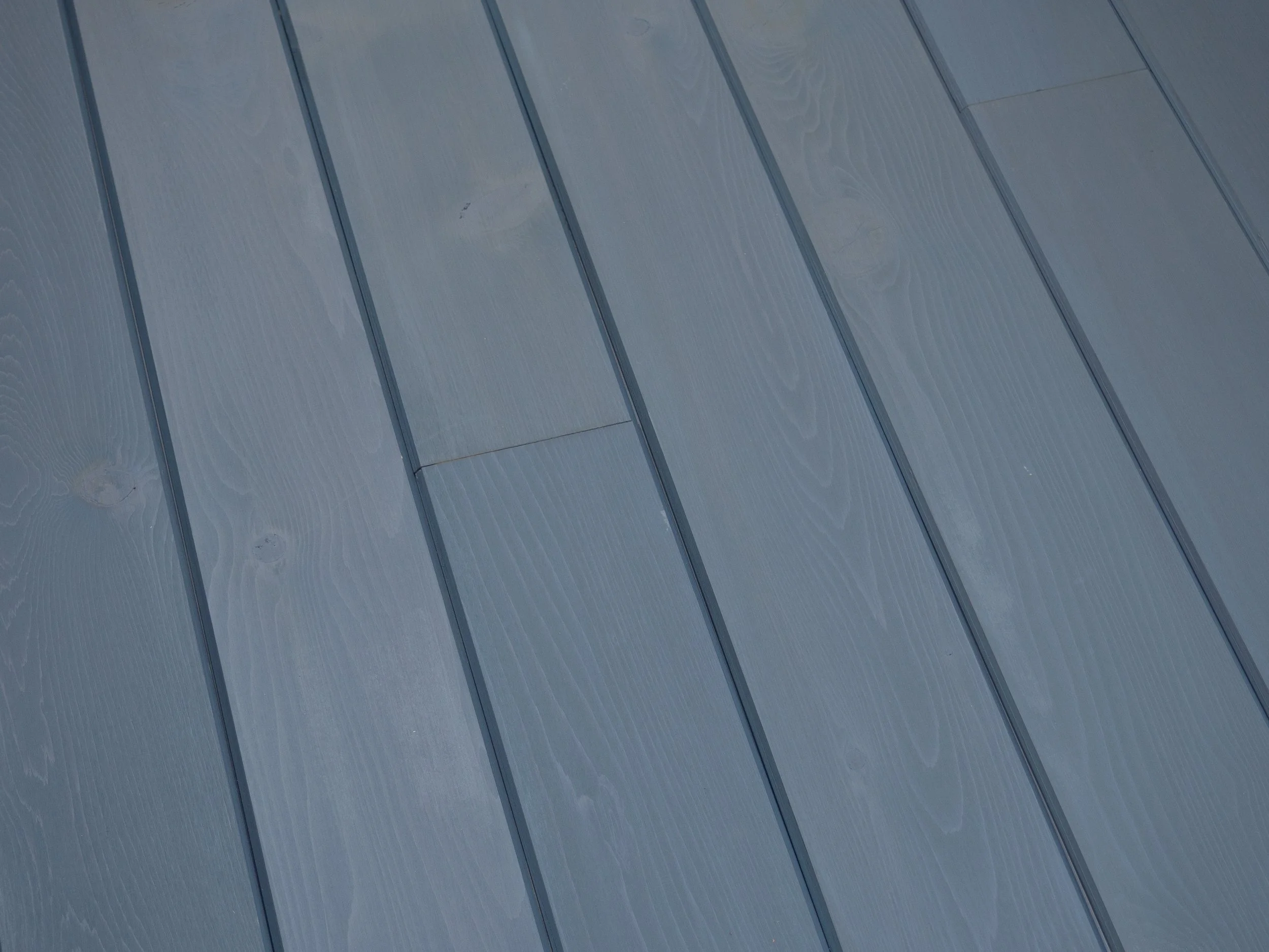 Fir wood with transparent dark blue finish