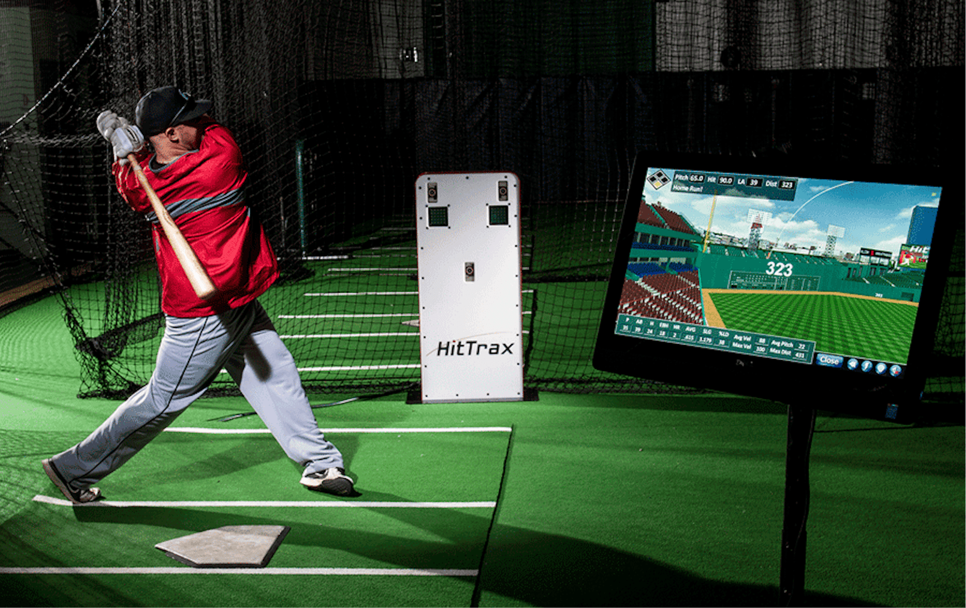 Photo of batter hitting within a HitTrax system