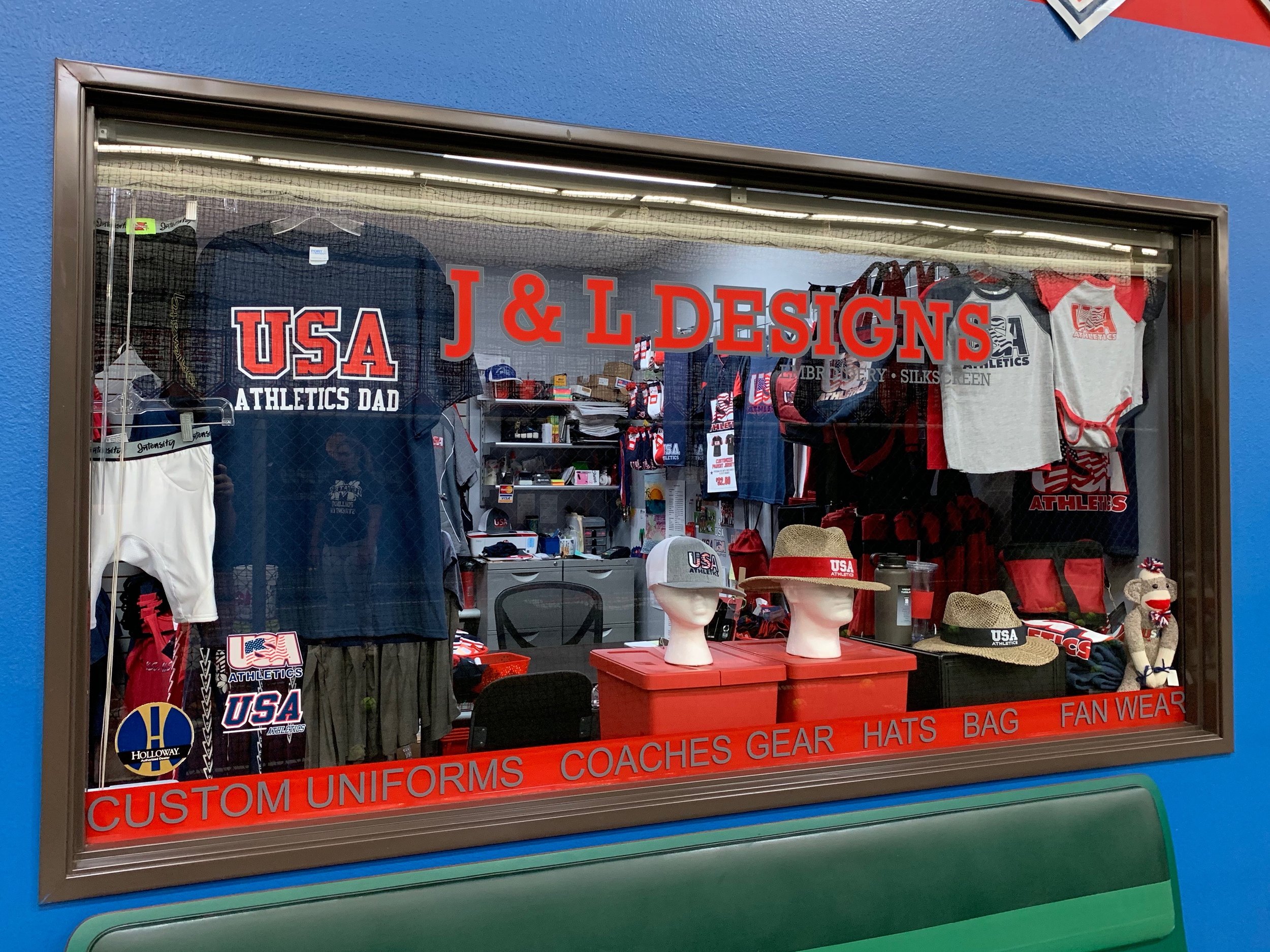 A look inside J&L Design’s shop at On Deck in Long Beach. Featuring custom uniforms, gear for coaches, hats, bags, and fan wear.