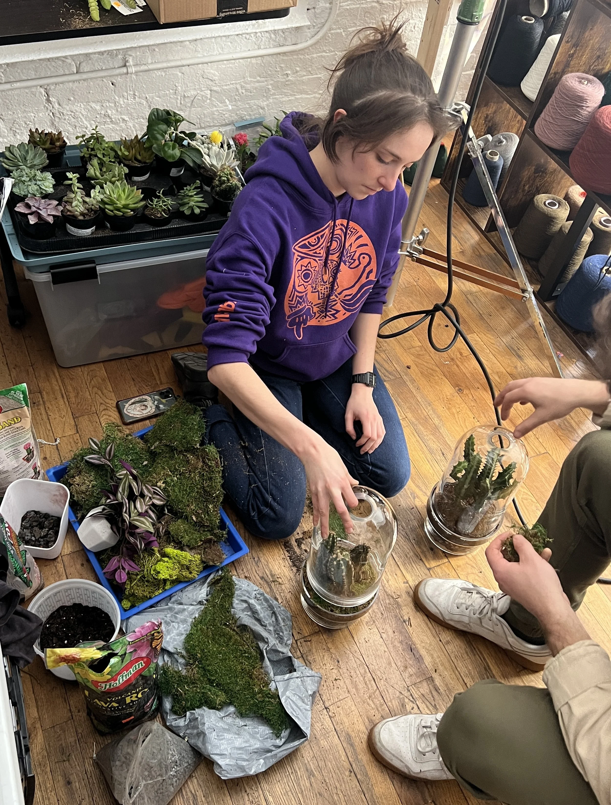 Grace assembling some terrariums 