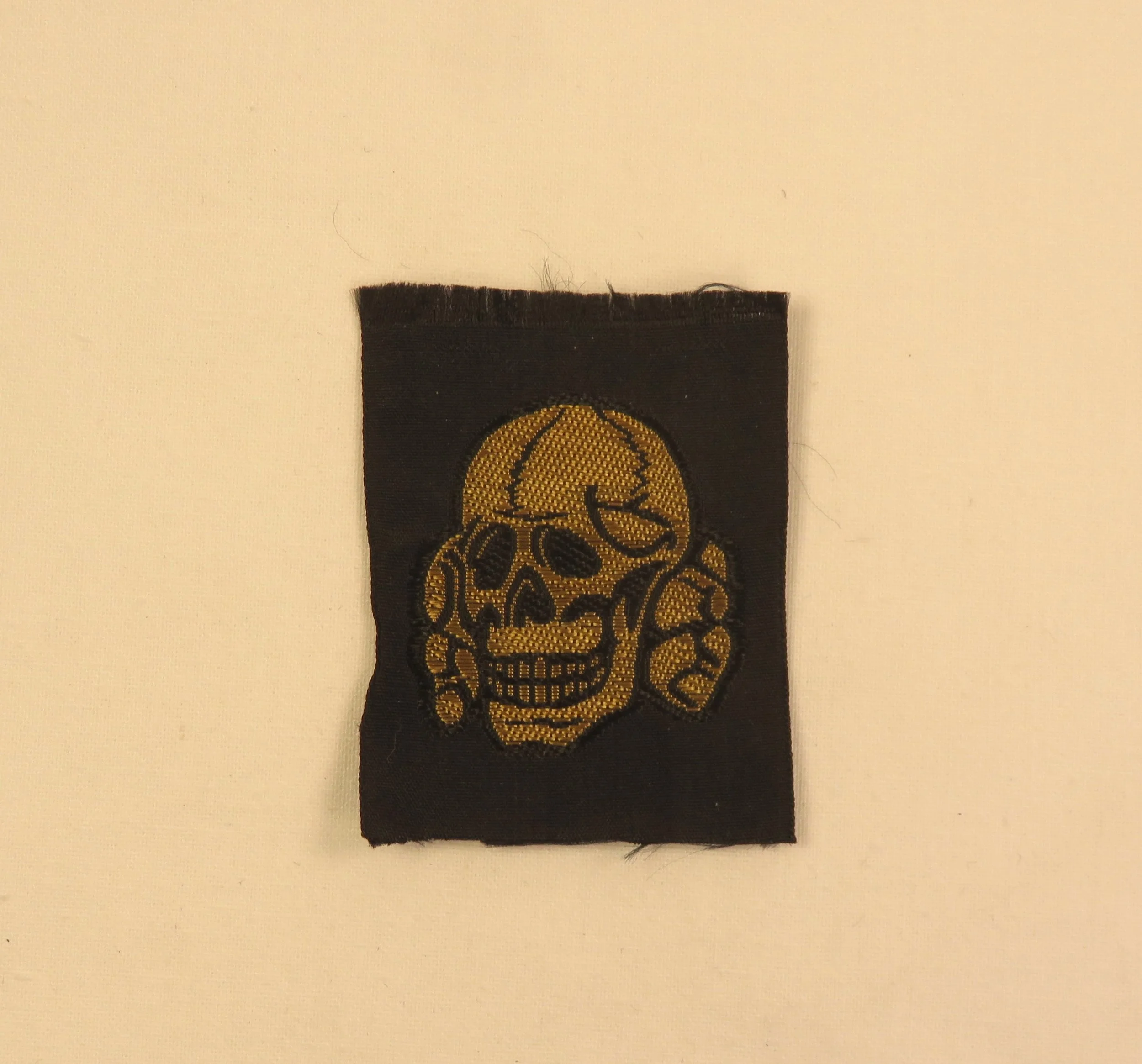 Germany.  Waffen-SS Tropical Totenkopf Cap Insignia