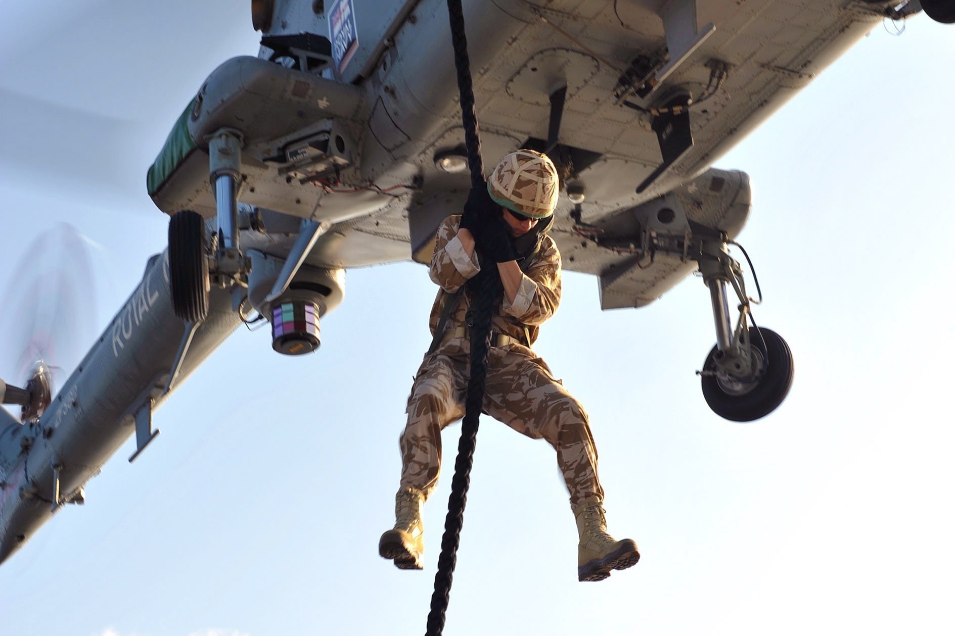 Royal_Navy_Personnel_Fast_Rope_onto_HMS_Cornwall_During_Boarding_Drills_MOD_45152197.jpeg
