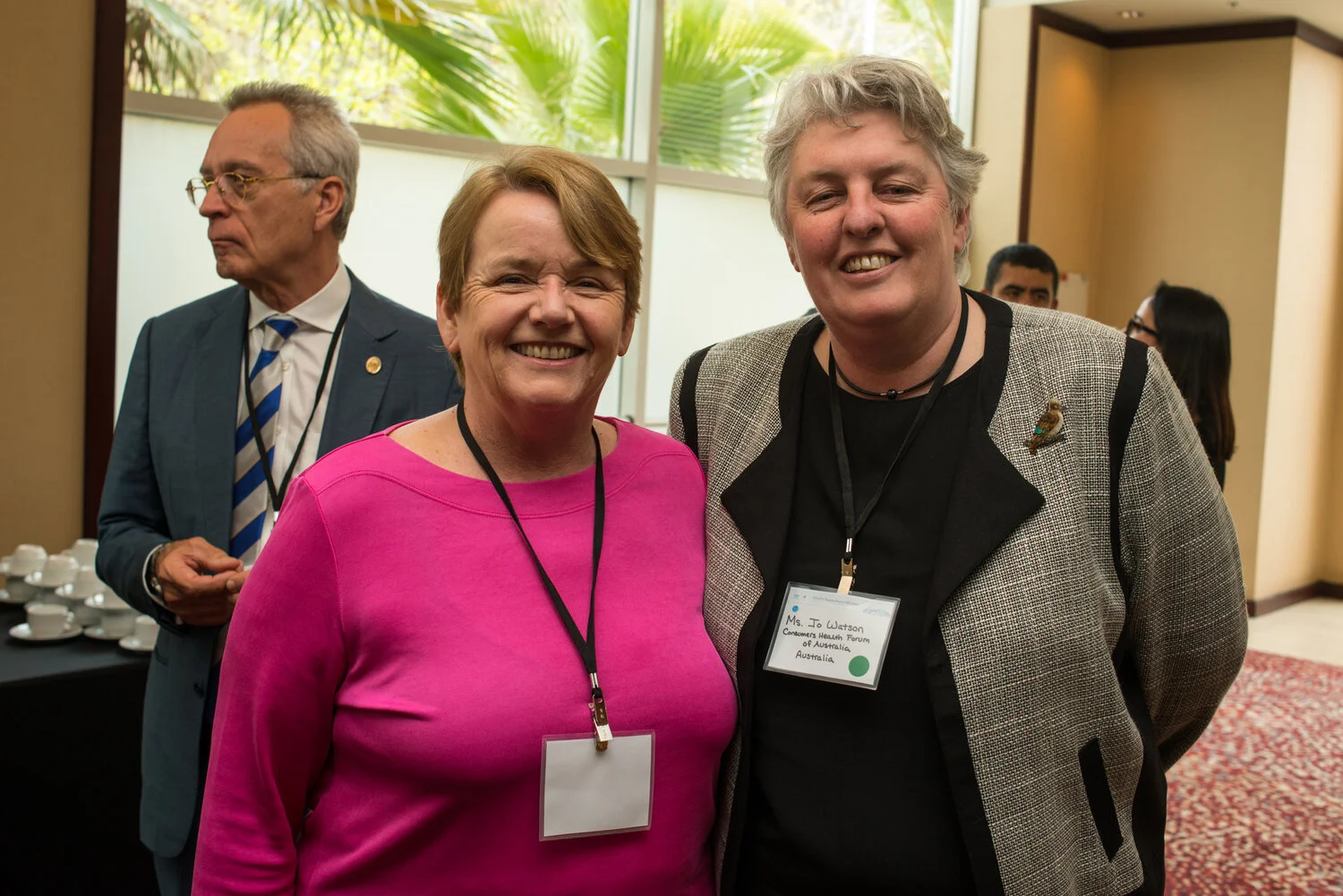 Alison Verhoeven from Australian Healthcare and Hospitals Association (left), Jo Watson from Consumer Health Forum (right), and Andreas Loefler, Australian Orthopaedic Association Past President (background)