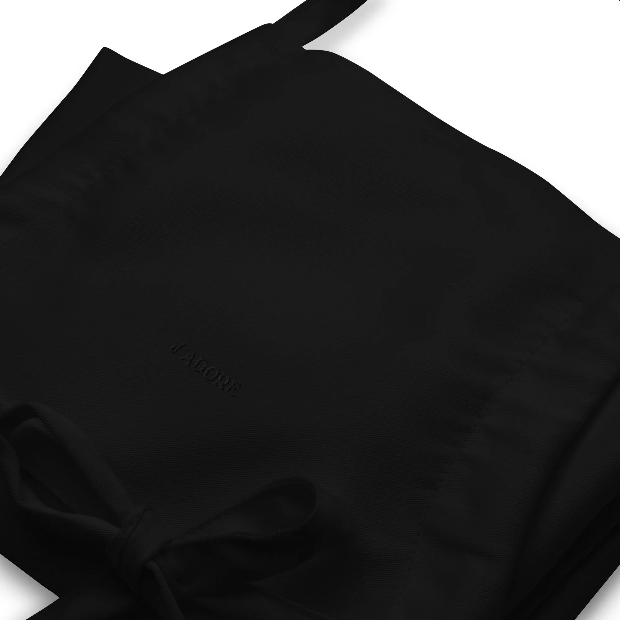 embroidered-apron-black-zoomed-in-68e7eeb2c1a99.jpg