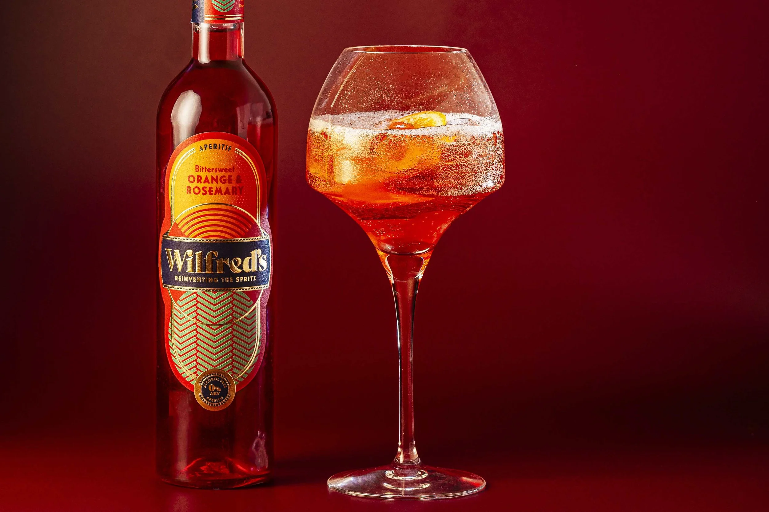 A finished Wilfred's spritz with a slice of orange
