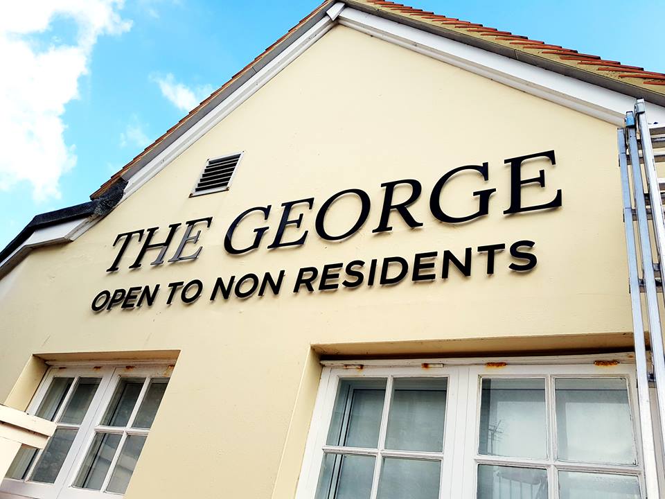 The George Hotel wall sign