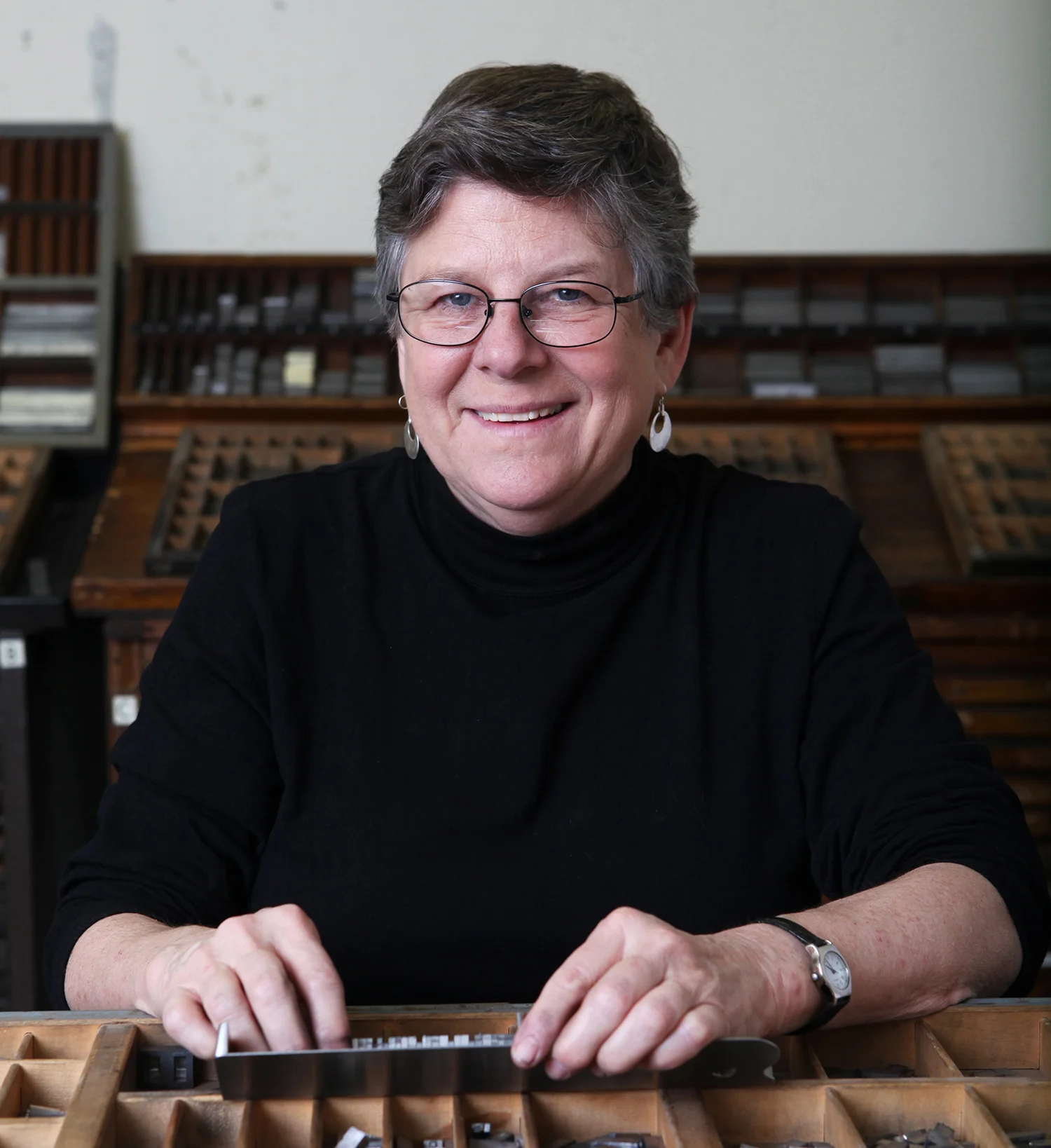 Katie at type tray.jpg
