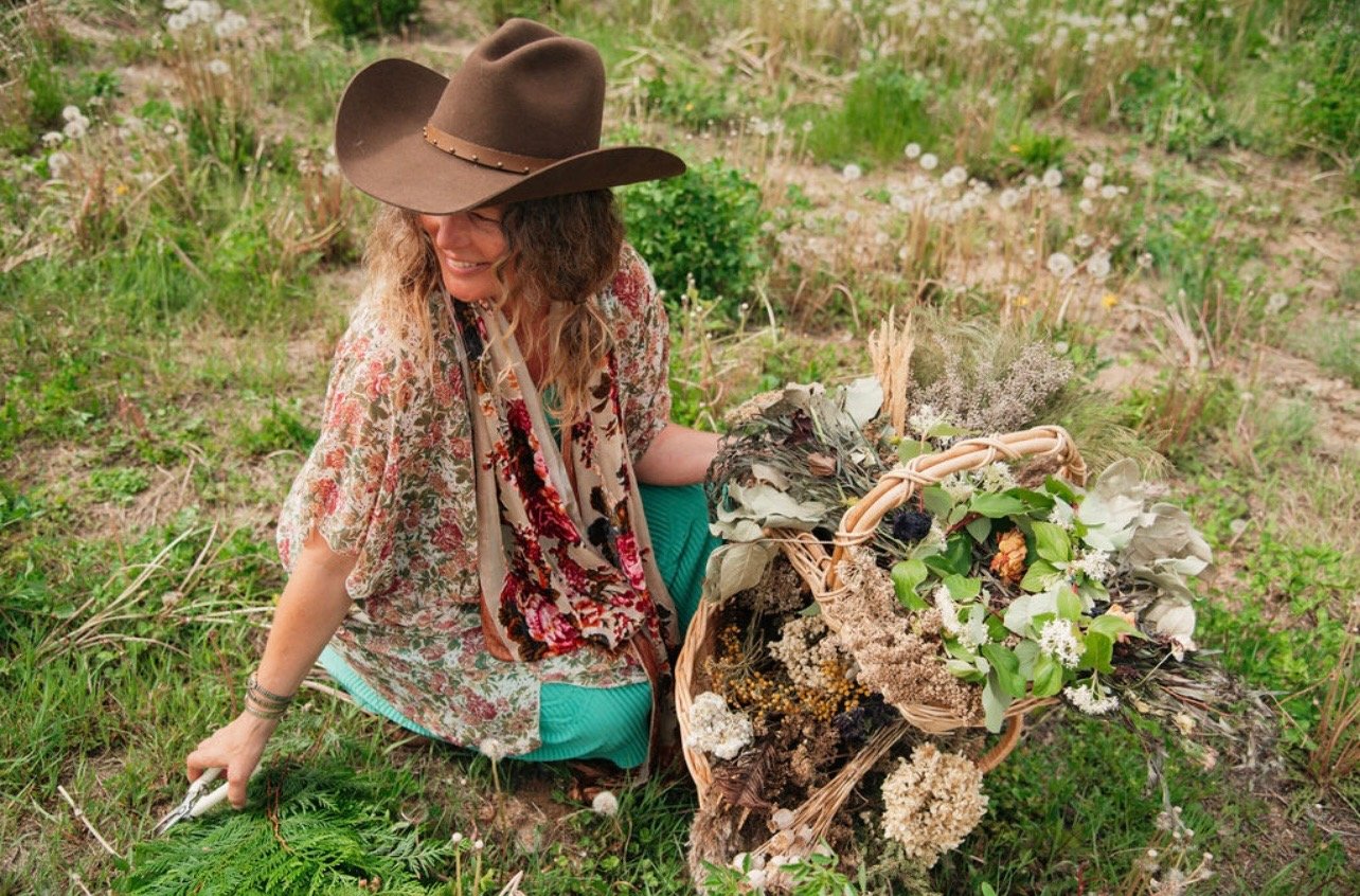 Girl with basket of flowers.JPEG