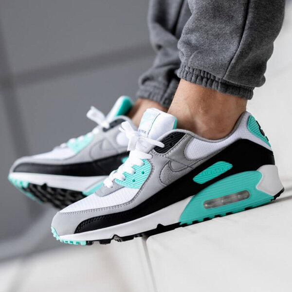 Good sizes are available for the 'Hyper Turquoise' Nike Air Max 90 