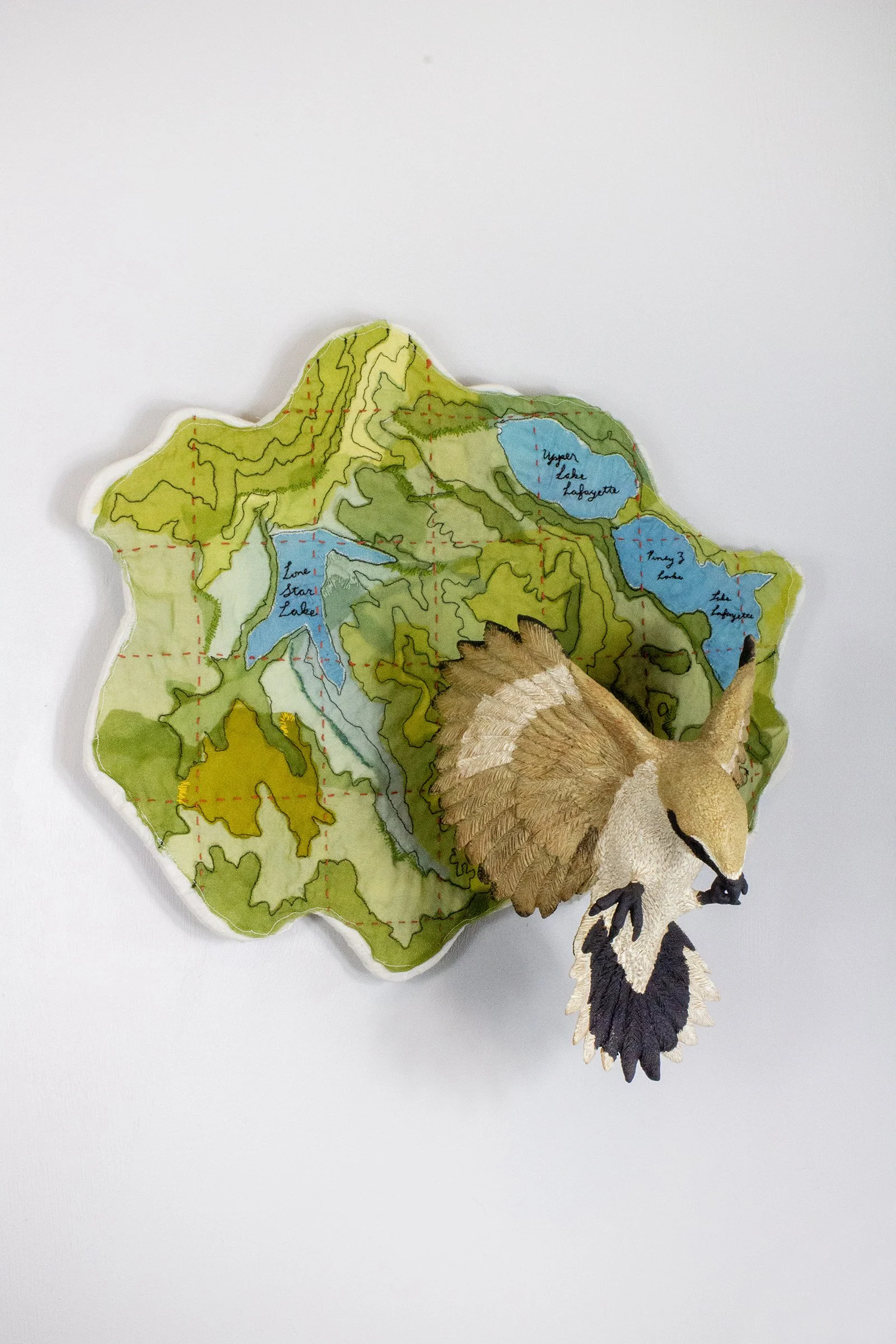 In flight: Loggerhead Shrike 
2025
19 H x 20 W x 10 D
Locally sourced Missouri clay, terra sigillata, hand dyed silk, cotton, embroidery floss
