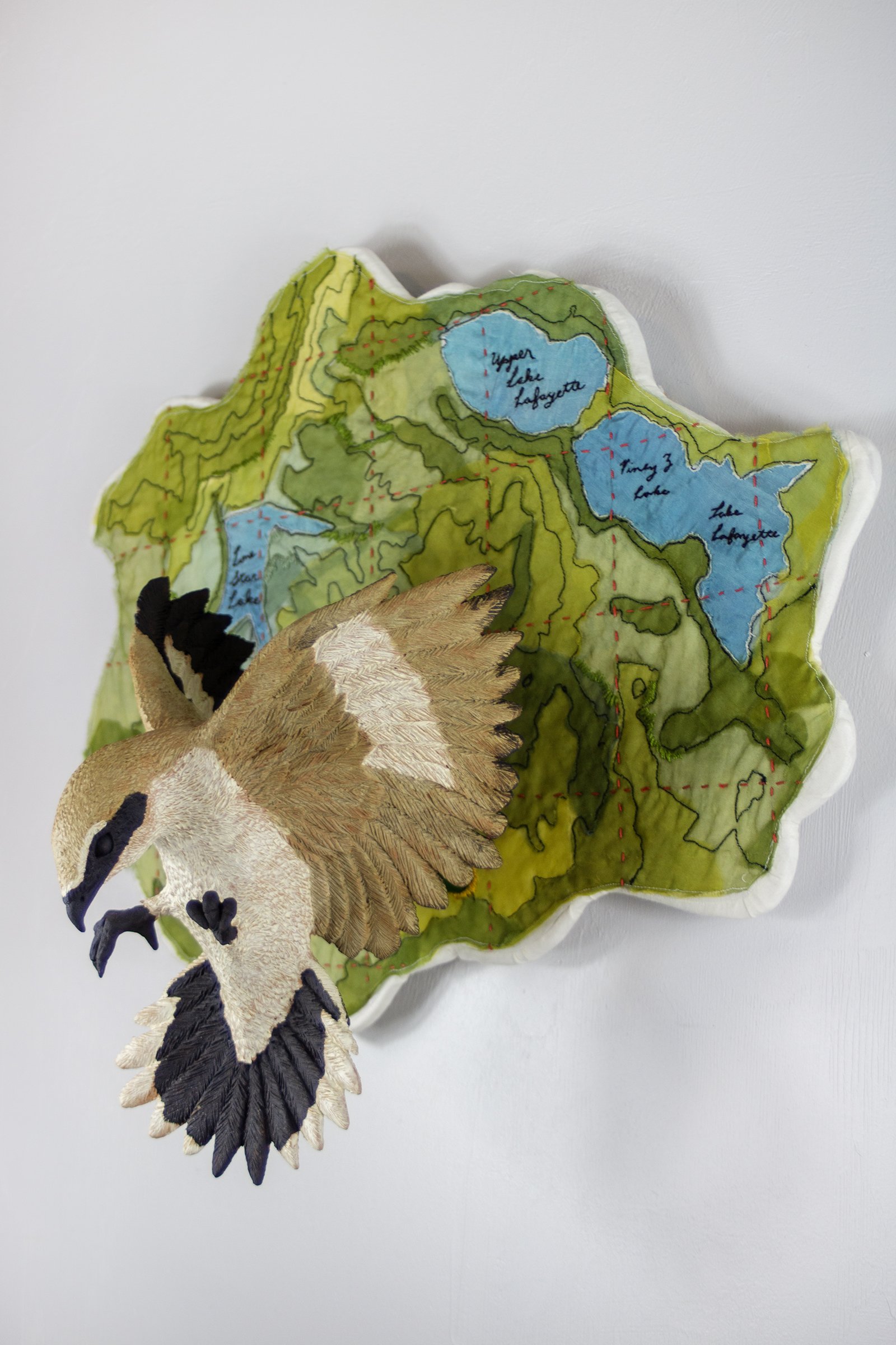 In flight: Loggerhead Shrike 
2025
19 H x 20 W x 10 D
Locally sourced Missouri clay, terra sigillata, hand dyed silk, cotton, embroidery floss
