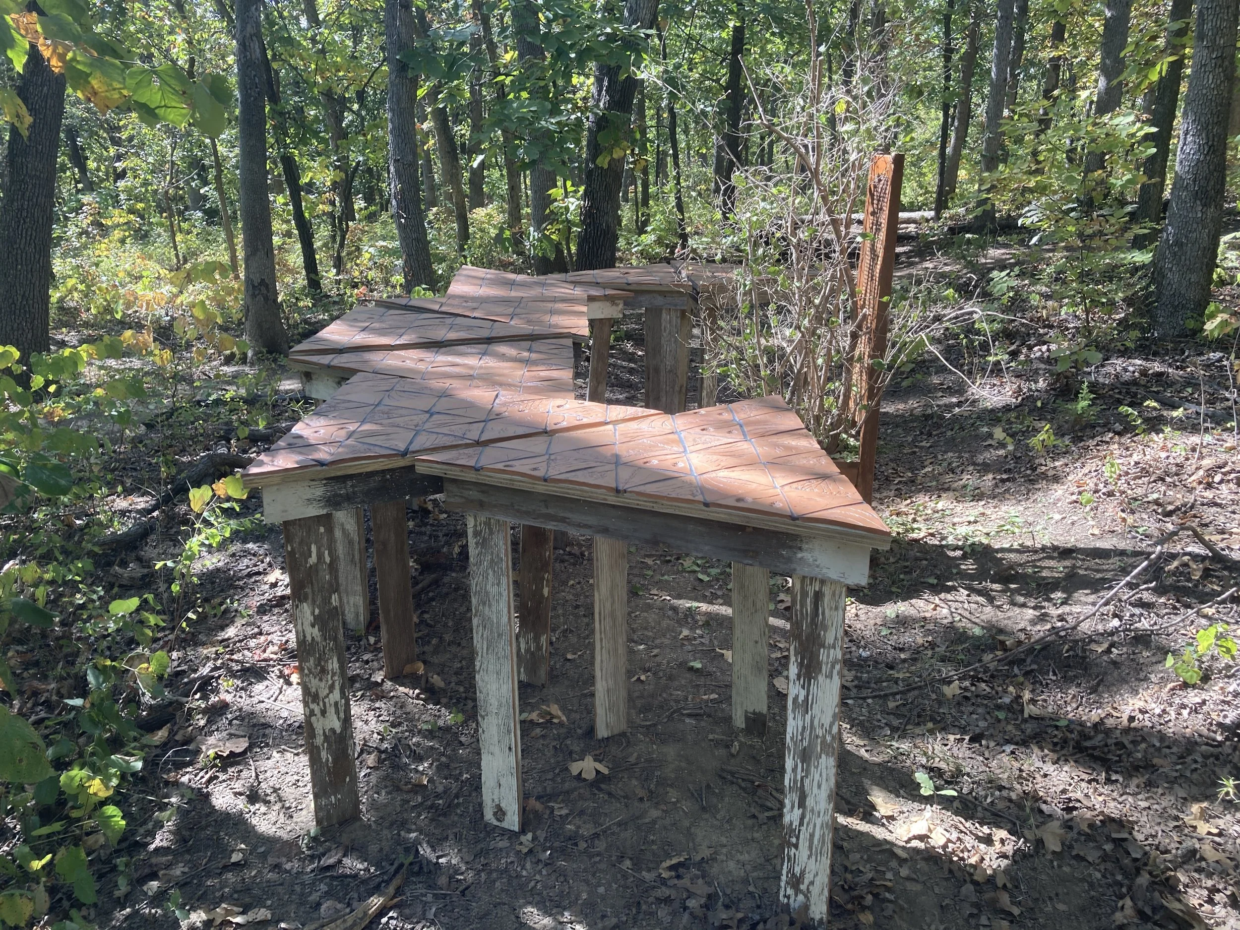 A seat at the table
2022
72” x 96” x 50”
Locally sourced clay, aged wood, found chair, honeysuckle branches
