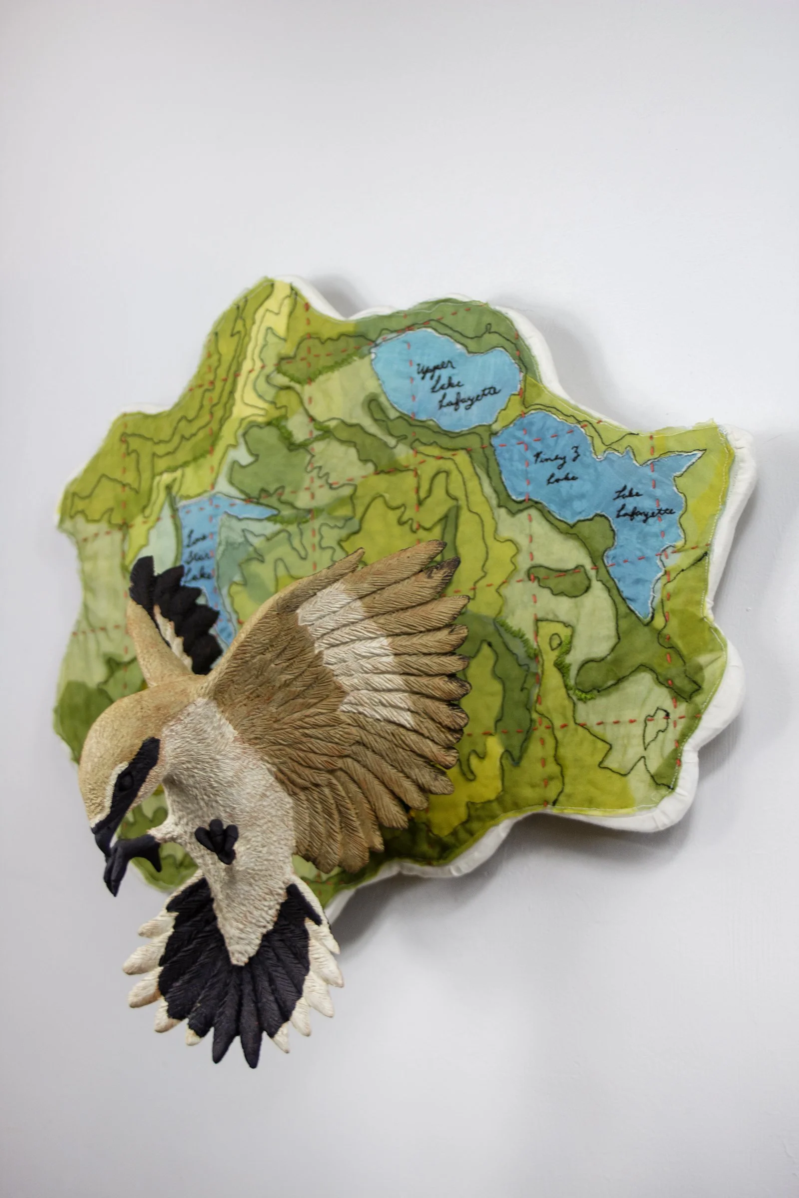 In flight: Loggerhead Shrike 
2025
19 H x 20 W x 10 D
Locally sourced Missouri clay, terra sigillata, hand dyed silk, cotton, embroidery floss
