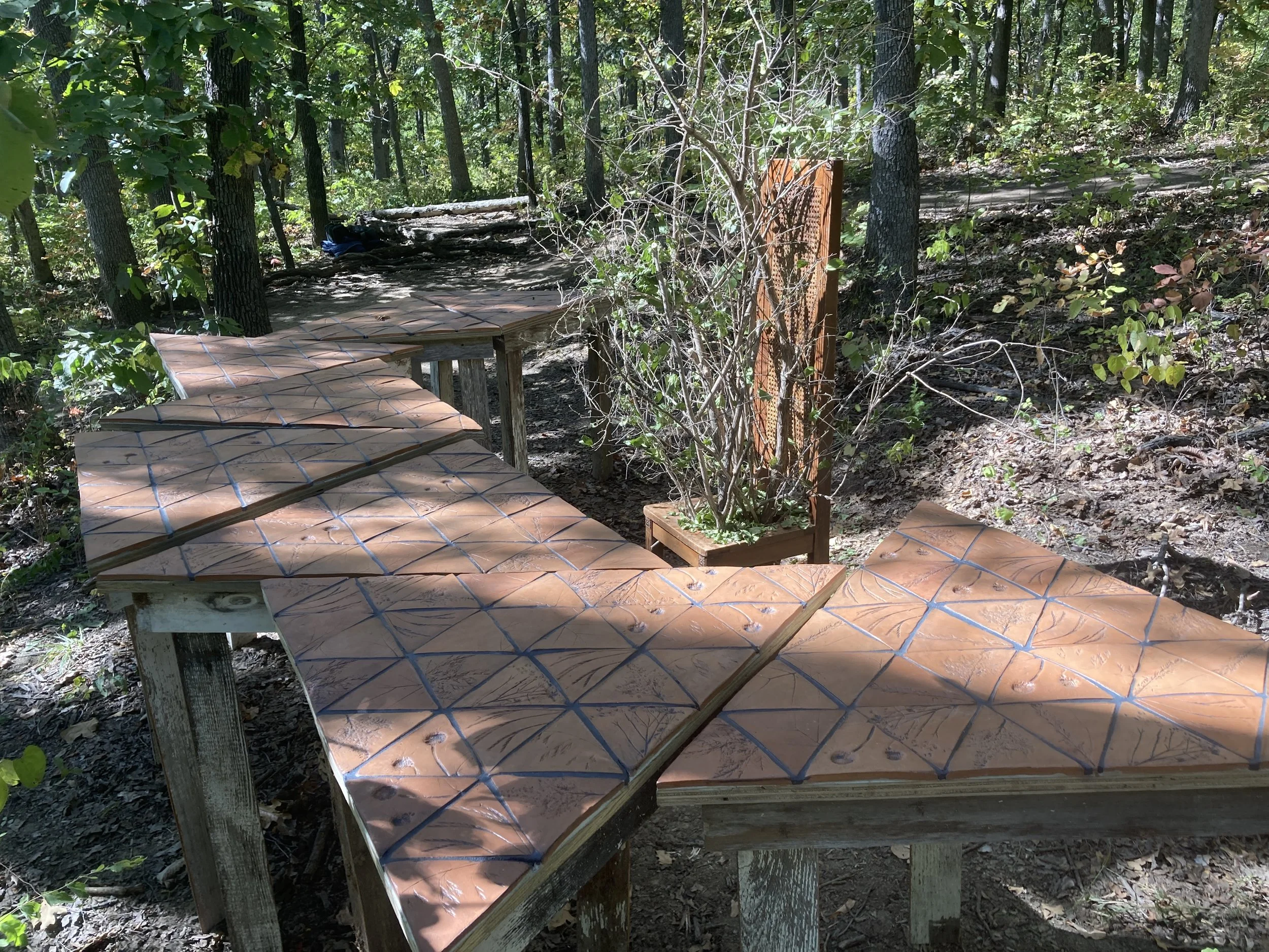 A seat at the table
2022
72” x 96” x 50”
Locally sourced clay, aged wood, found chair, honeysuckle branches
