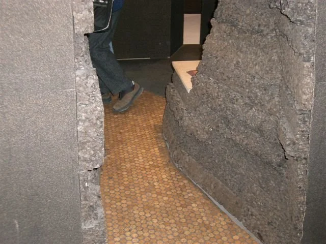 Using cork on the walls of a movie set look like rocks
