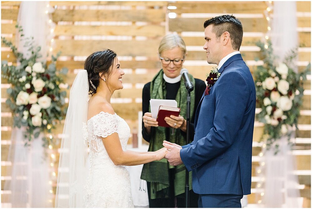  bride and groom during their wedding ceremony 