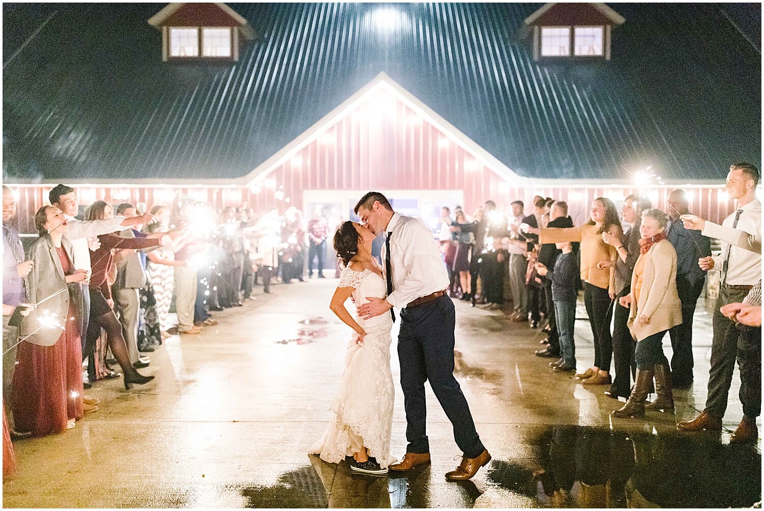  bride and groom at their grand exit with sparklers 