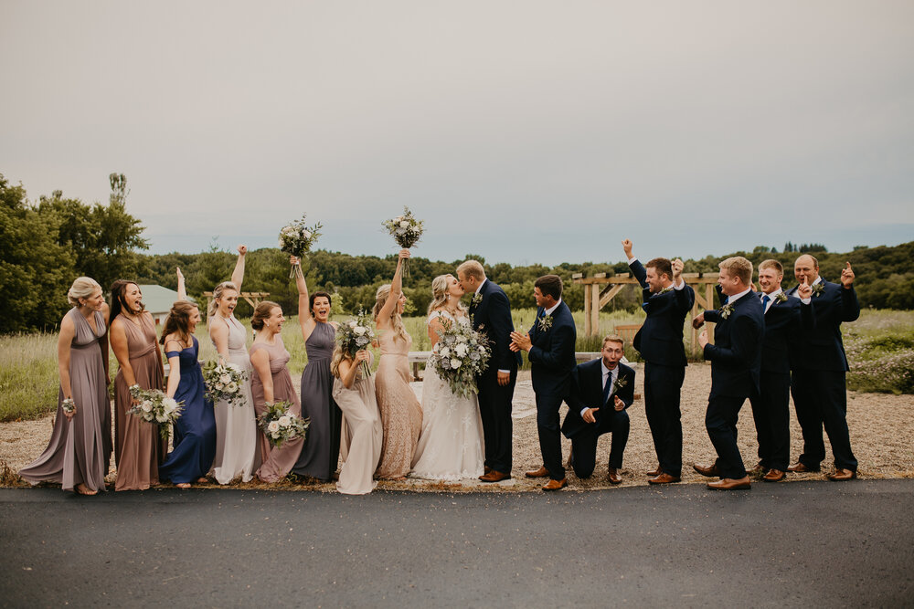  bride and groom with their bridal party before the wedding 