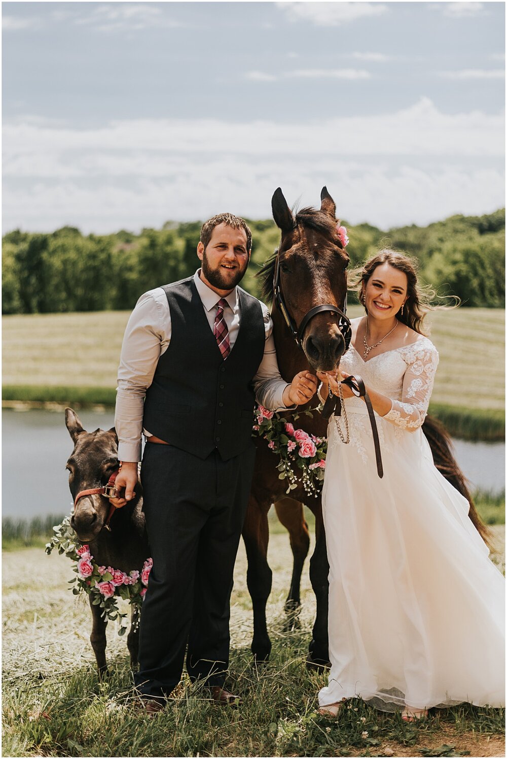  bride and groom portrait with horses before the wedding in mpls 