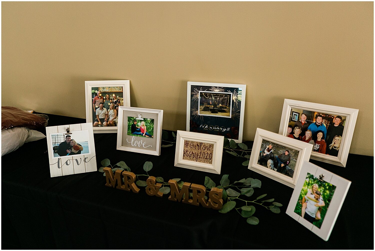  table with pictures of the bride and groom 