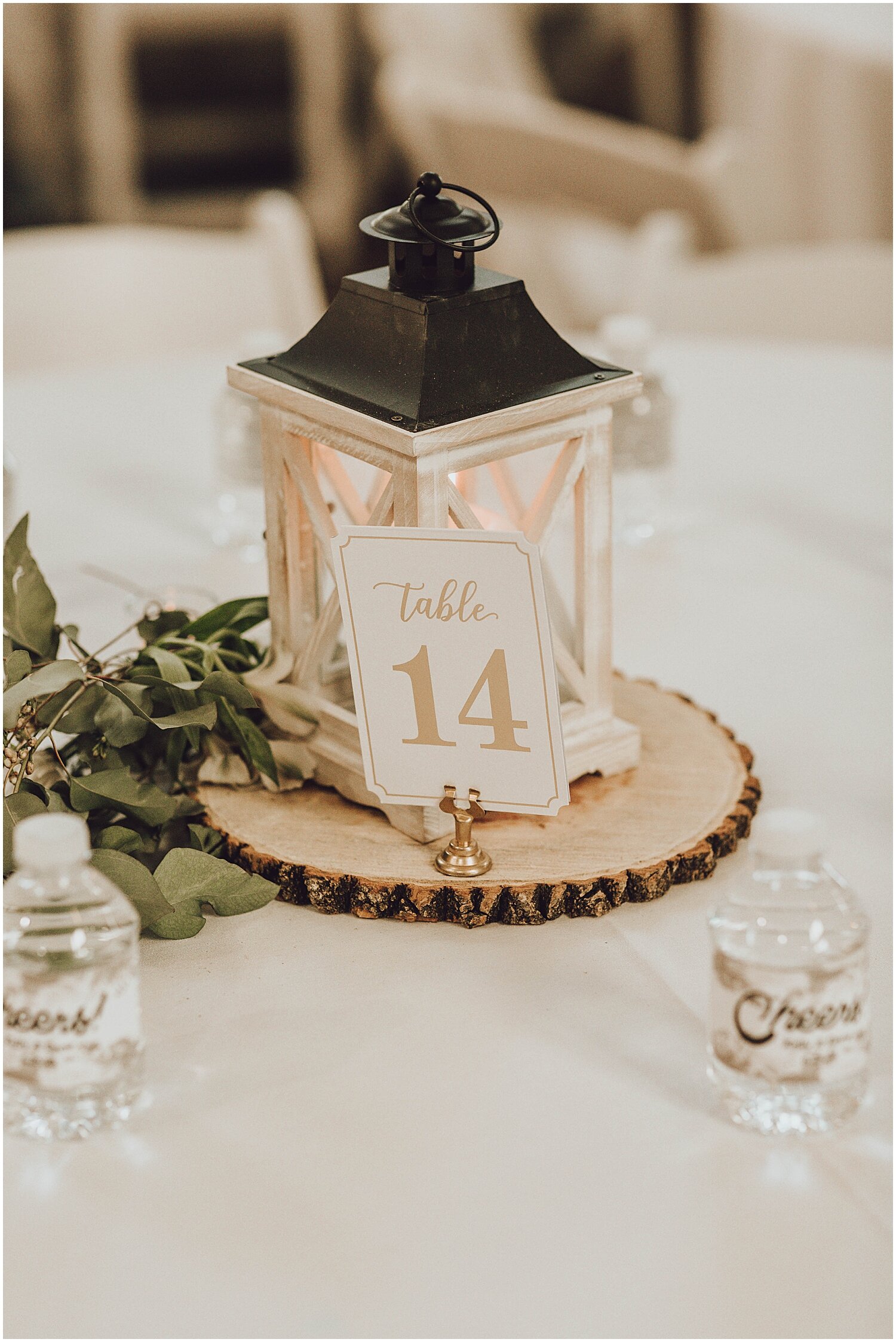  lantern wedding centerpiece with greenery decor 