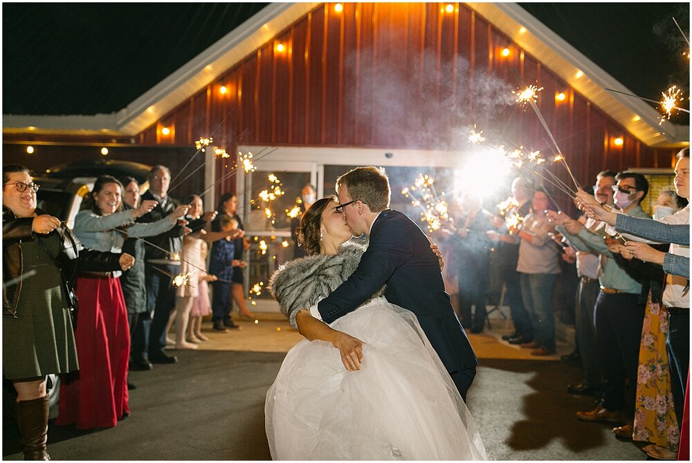  bride and groom’s grand exit at the outpost center 