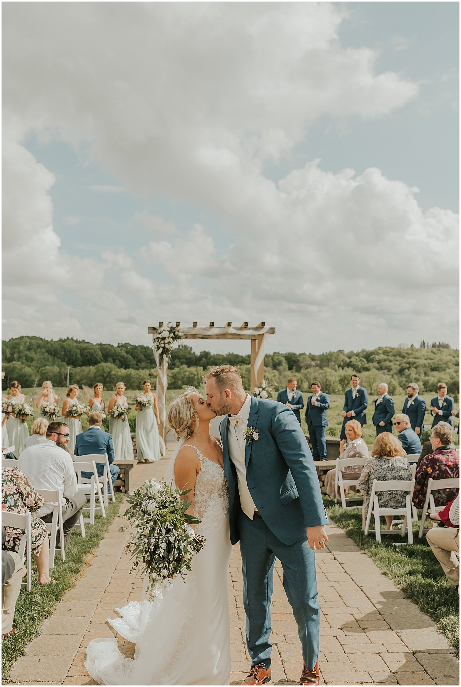  Bride and groom at their outdoor wedding ceremony in MPLS 