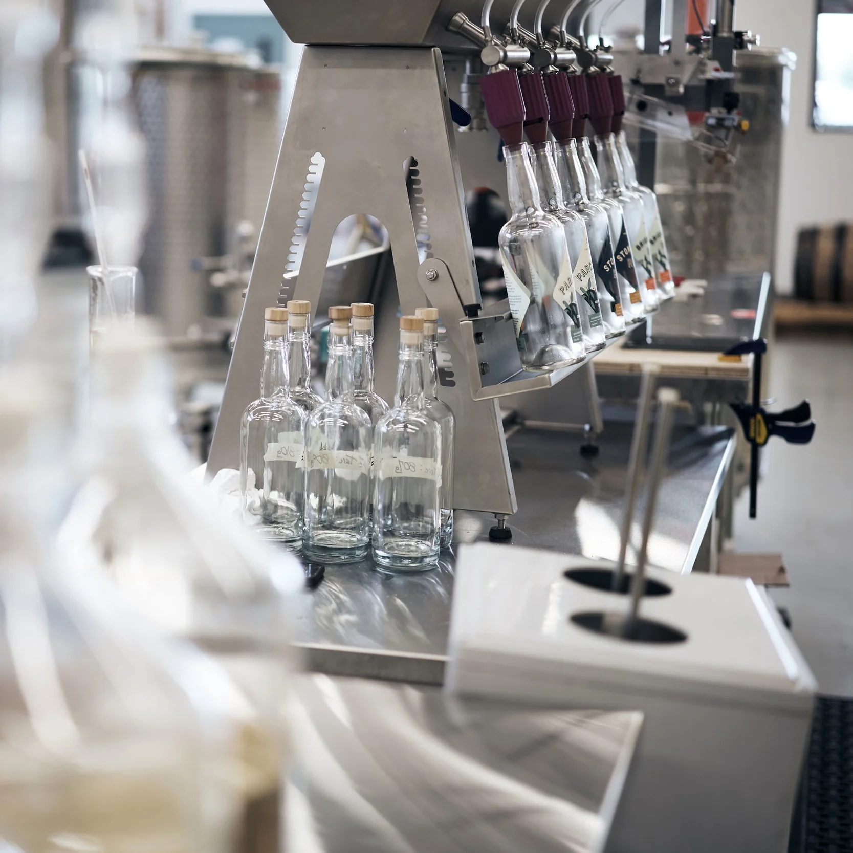 three of strong spirits, rum bottling