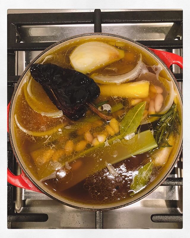 gentle foods &bull; made a cozy vegetable broth last night with onions, celery, carrots, bay leaf, peppercorn, half a head of garlic, and rosemary. tossed in a dried pep (toast it first in dry skillet to wake things up) and let everything go for abou