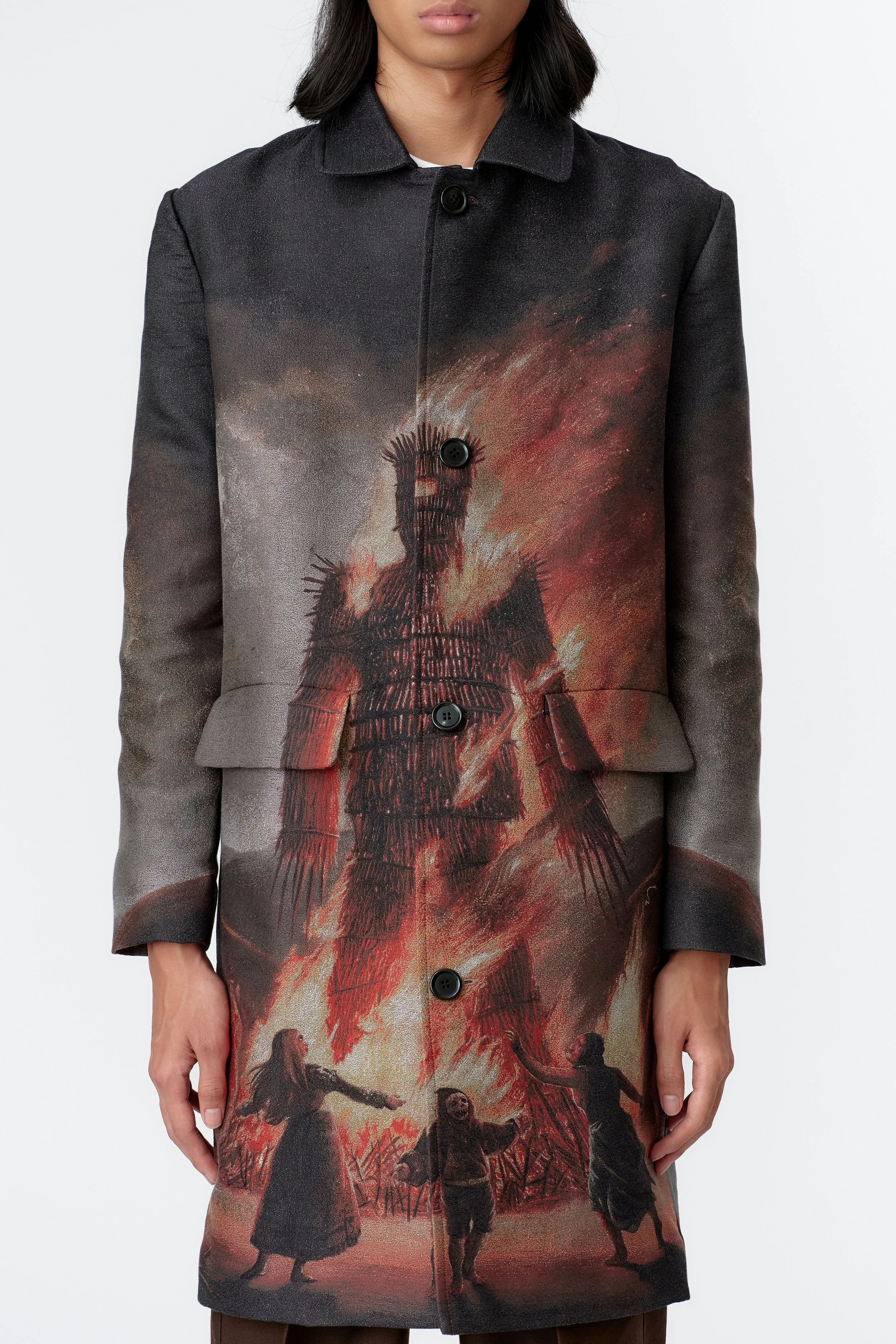 Close-up of original Stevie Anderson Wickerman artwork woven into jacquard overcoat fabric