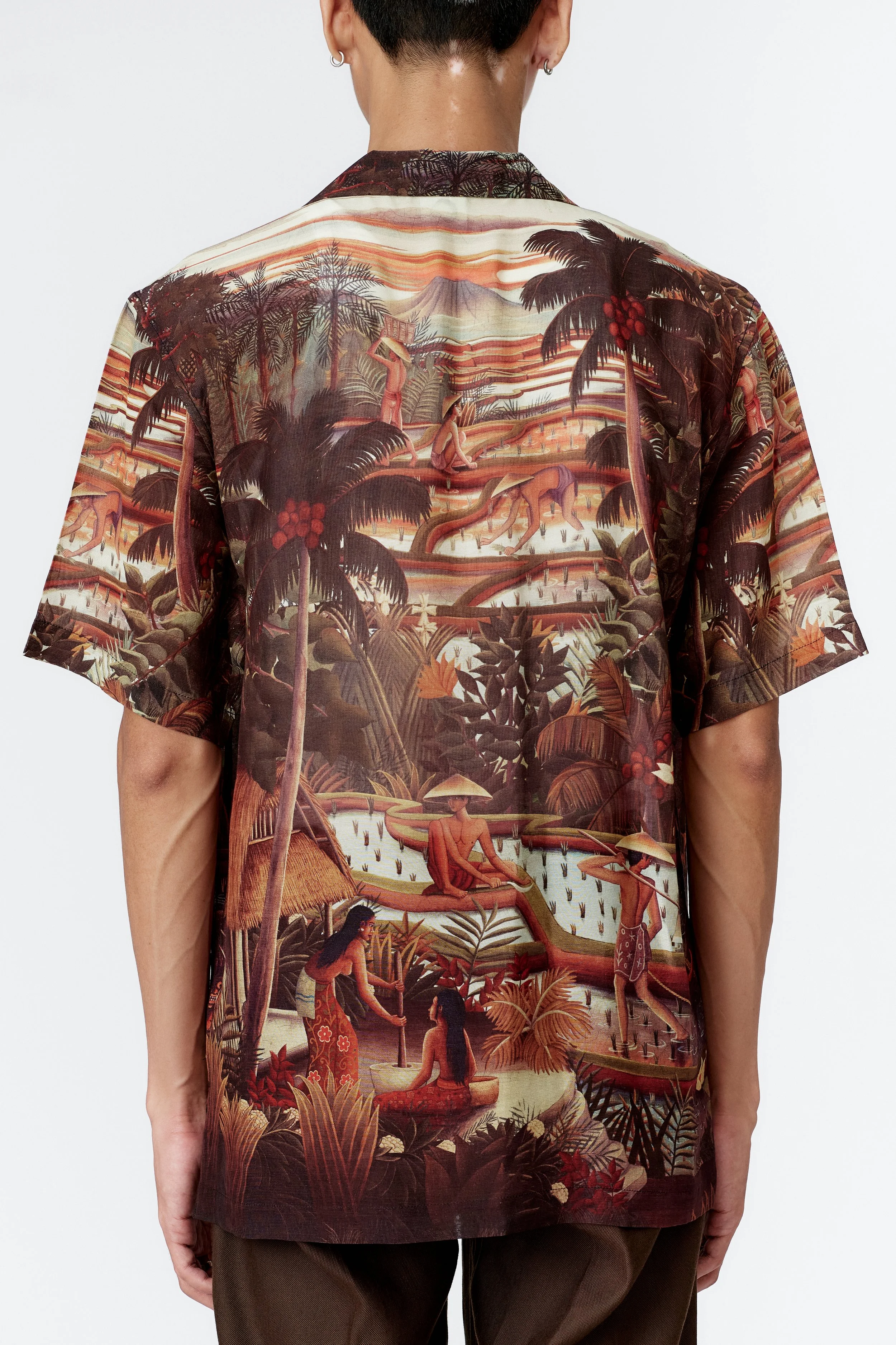 Back view Fabric texture close-up smooth silk rayon blend with multi-colour tropical print