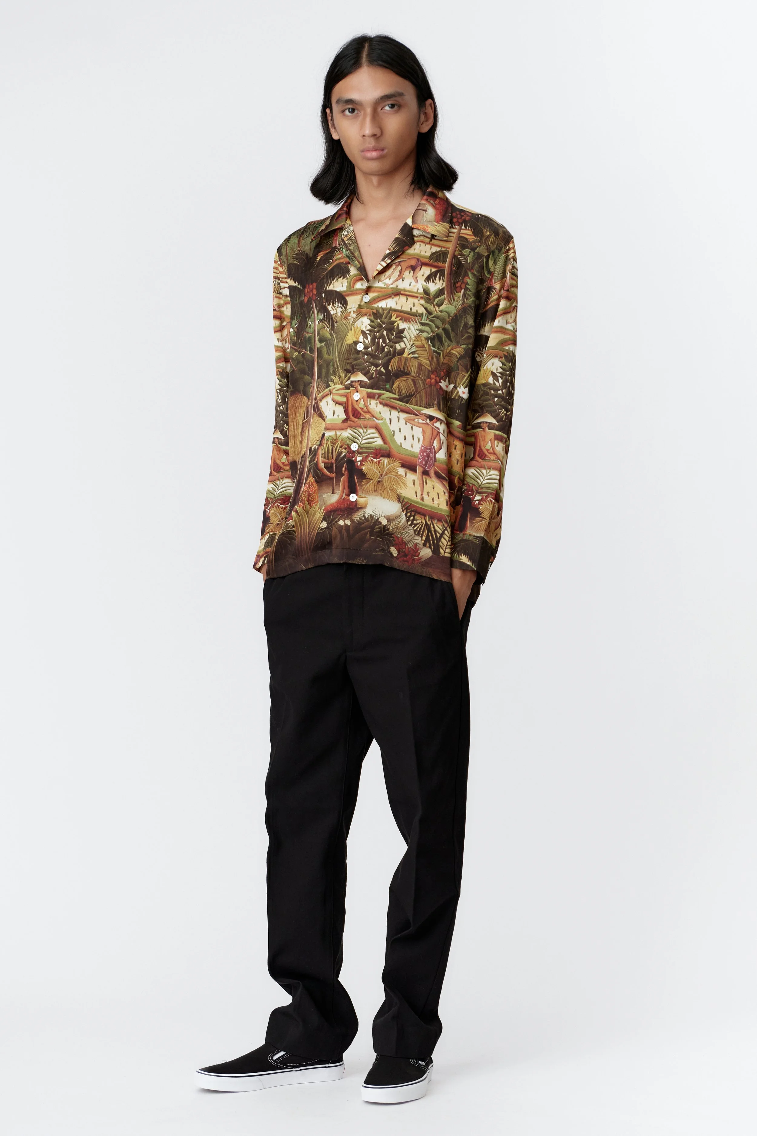 Front view of Subak Green silk satin long sleeve shirt with colourful Bali landscape artwork and camp collar.