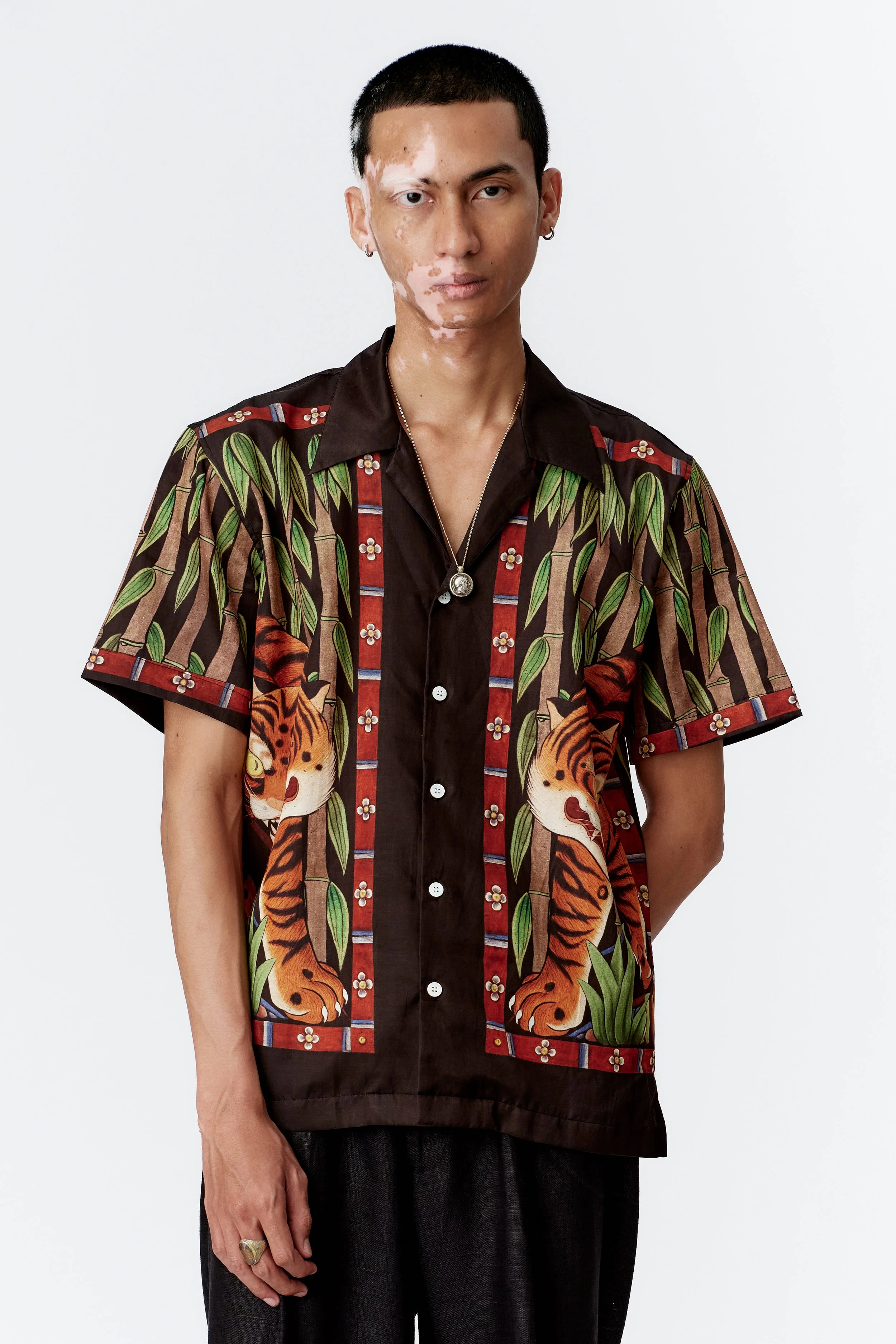 Front view of model wearing Tiger Border silk cotton shirt