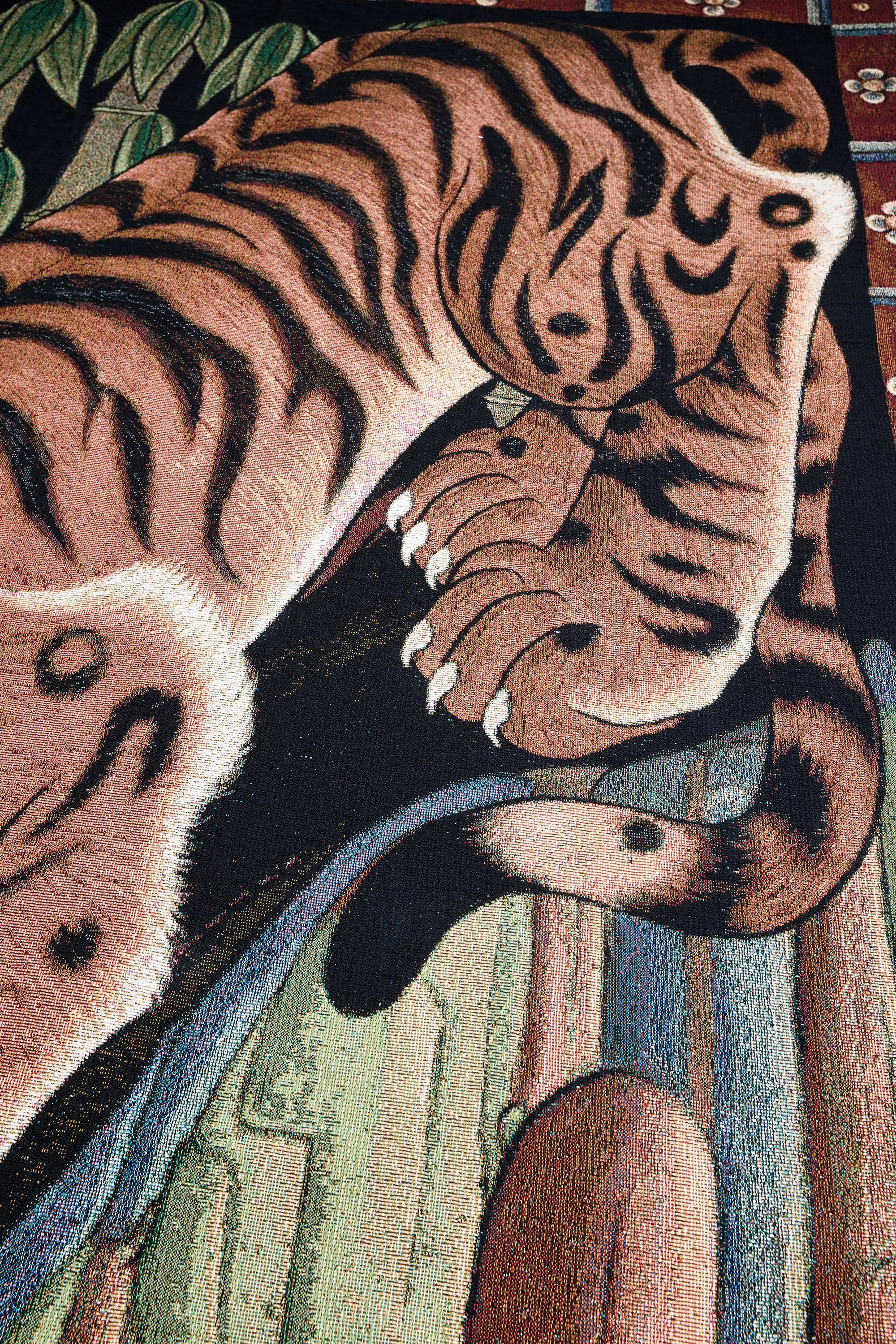 Limited edition Tiger Bamboo woven blanket featuring prowling orange tiger
