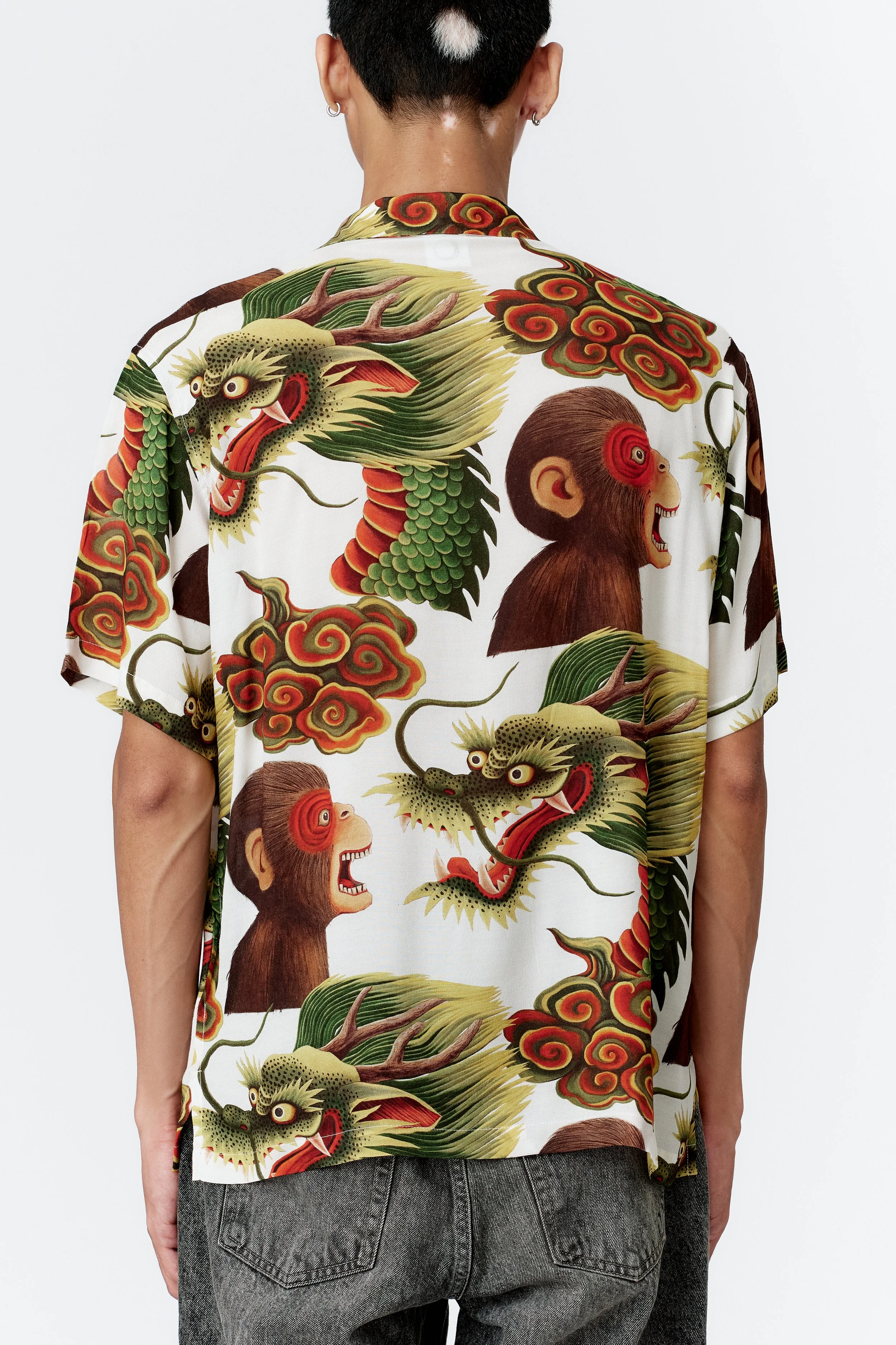 Back view of Monkey Dragon white camp collar shirt featuring multi-colour mythic illustration